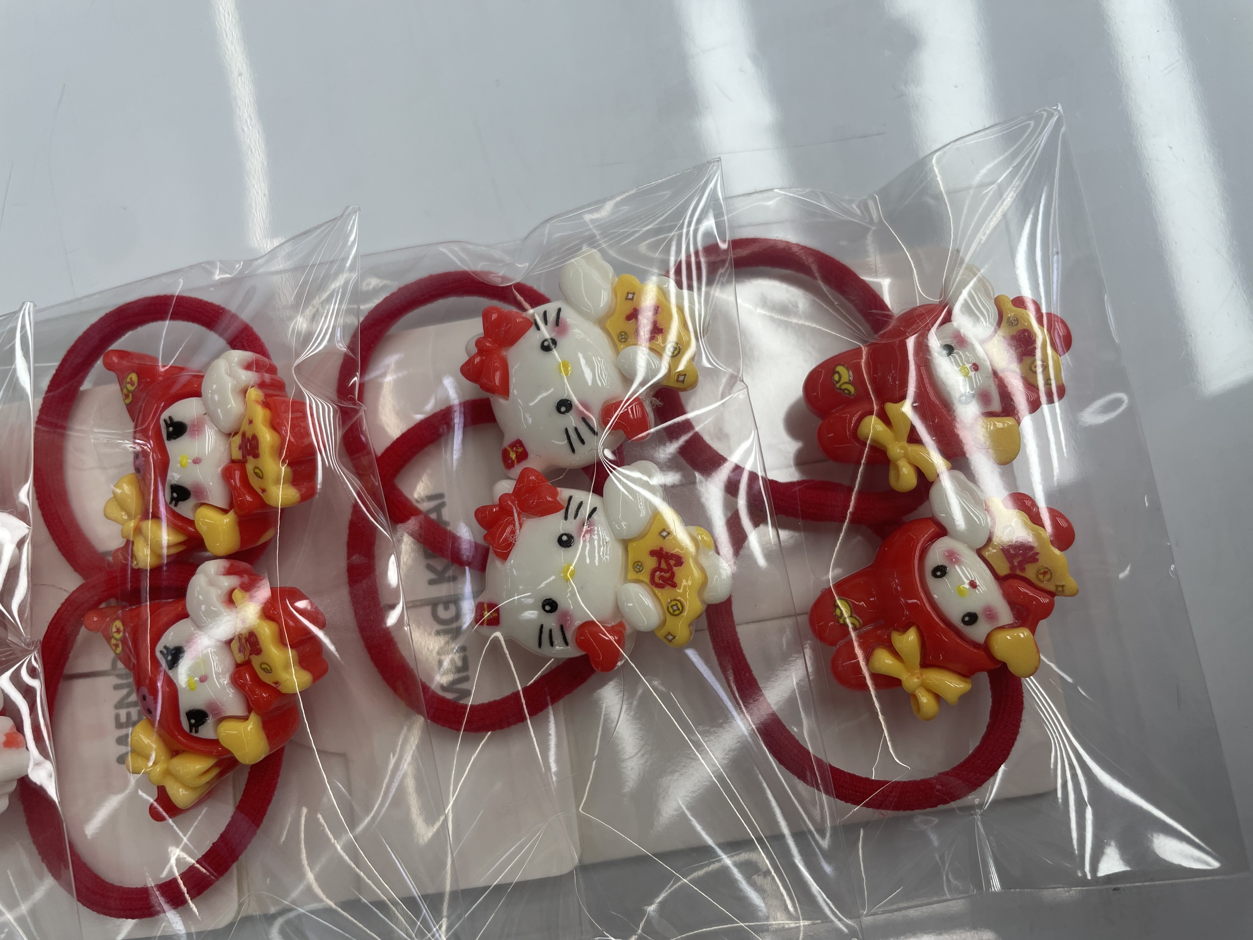 New red and festive headwear and hair tie, children's hair tie, women's hair tie, fashionable and trendy rubber band, simple and durable, won't damage hair. Rubber band headwear and hair tie Specification image