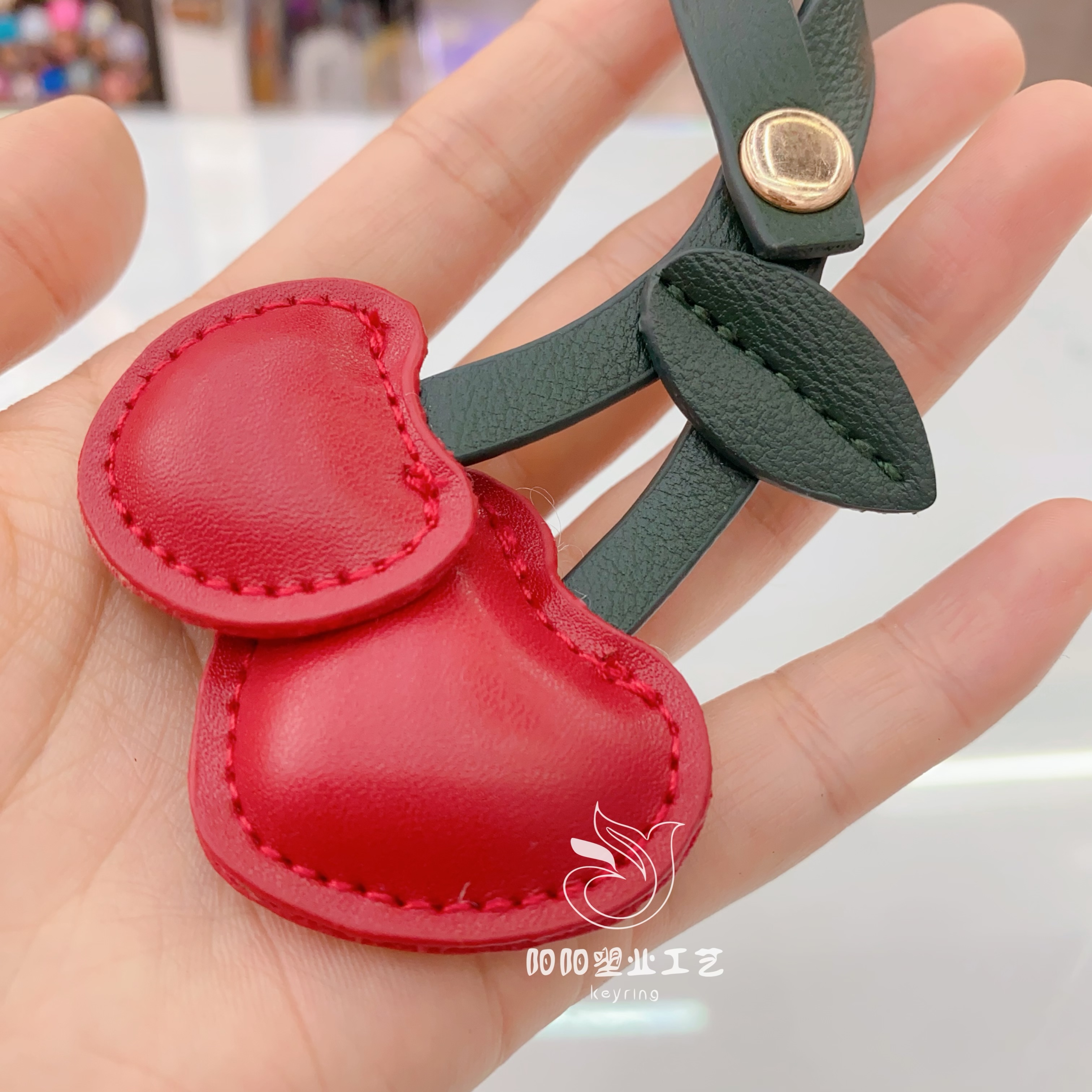 Niche PU leather bag pendants, cherry leather pendants, keychains, heart-shaped cherry bags, creative accessories, school bag buckles Item Picture