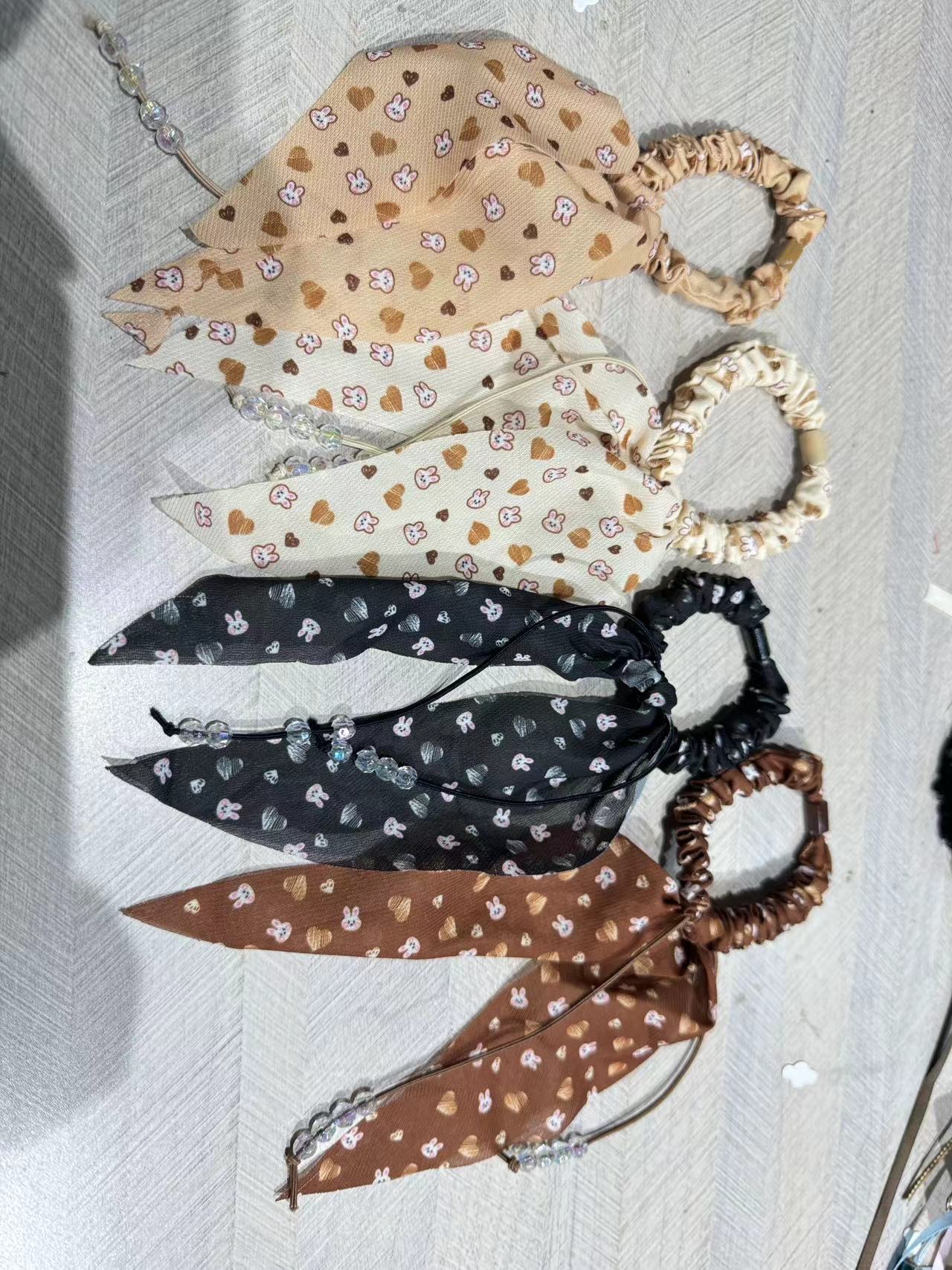 阳阳饰品2024年新款韩版时尚布圈长条领结头绳发圈头饰详情图4