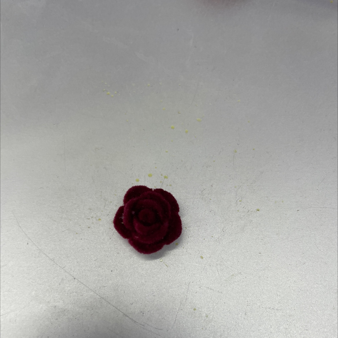 The 15mm velvet flower is dark red