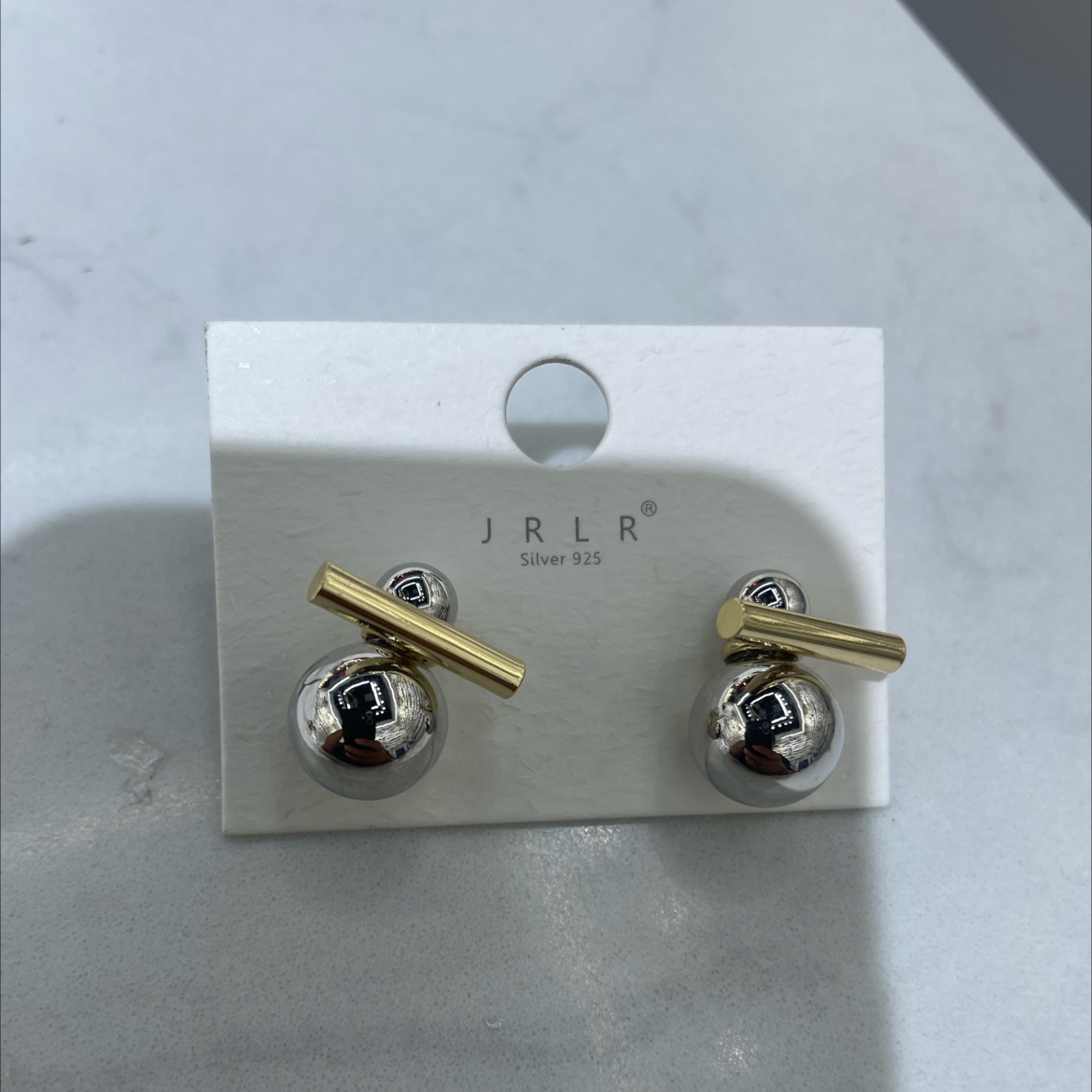 The Korean-style earrings feature a unique two-color design with geometric patterns. The earrings are fashionable and trendy. The ear clips are exquisite, durable and do not fade easily. High-quality materials are used to create personalized style accessories detail image 3
