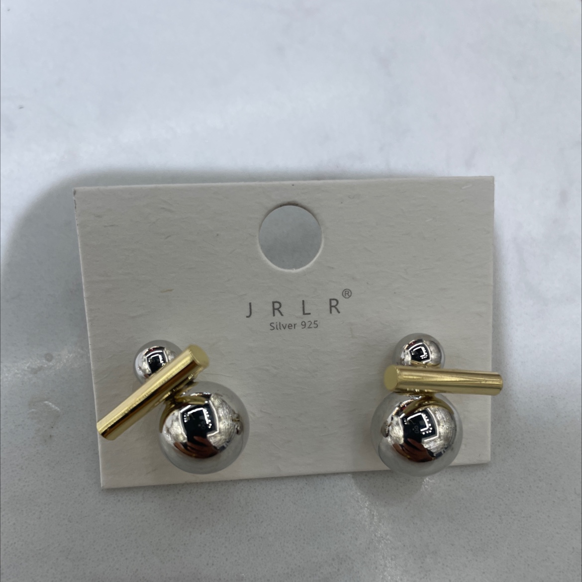 The Korean-style earrings feature a unique two-color design with geometric patterns. The earrings are fashionable and trendy. The ear clips are exquisite, durable and do not fade easily. High-quality materials are used to create personalized style accessories detail image 2
