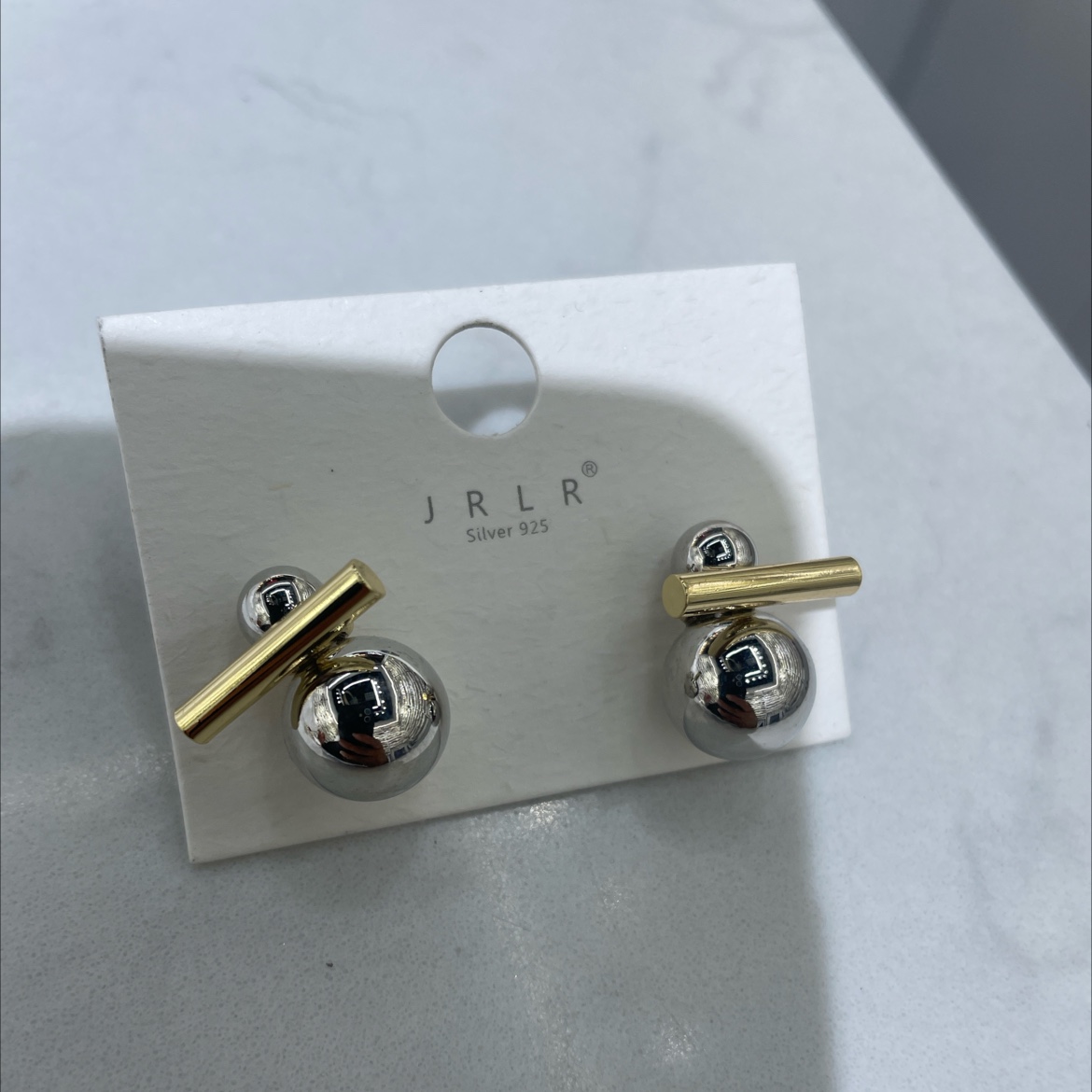 The Korean-style earrings feature a unique two-color design with geometric patterns. The earrings are fashionable and trendy. The ear clips are exquisite, durable and do not fade easily. High-quality materials are used to create personalized style accessories detail image 4