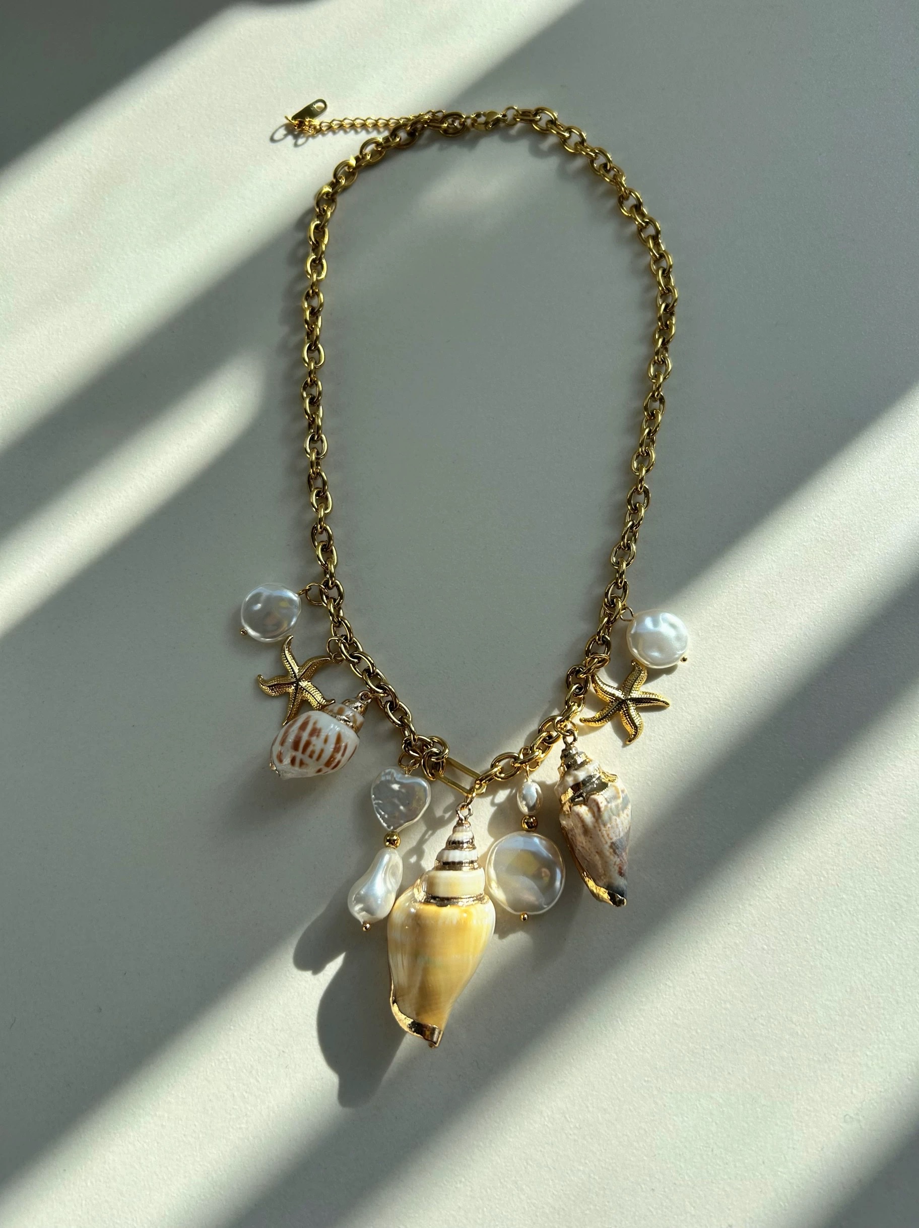 Titanium steel necklace with vacation style, Marine elements, island design, diy multi-pendant necklace, titanium steel plated with 18k gold, no color fading Specification image