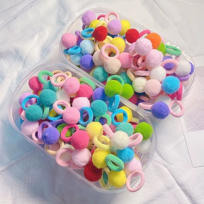 The girl's colorful pom-ball hair band is super cute. The new rubber band is adorable for kindergarten girls. The hair band has a bouncy elasticity detail image 4