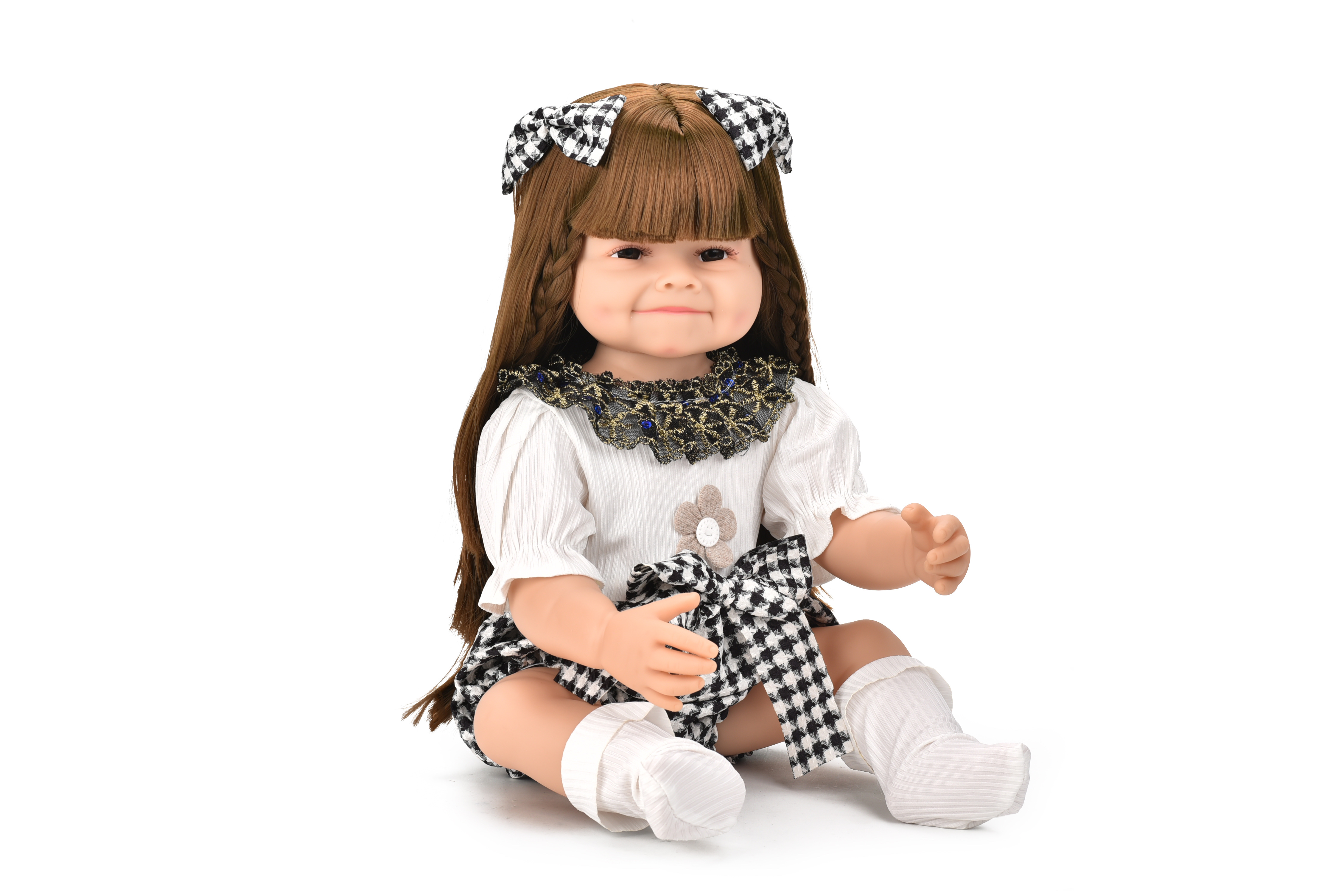 A 55cm vinyl toy doll