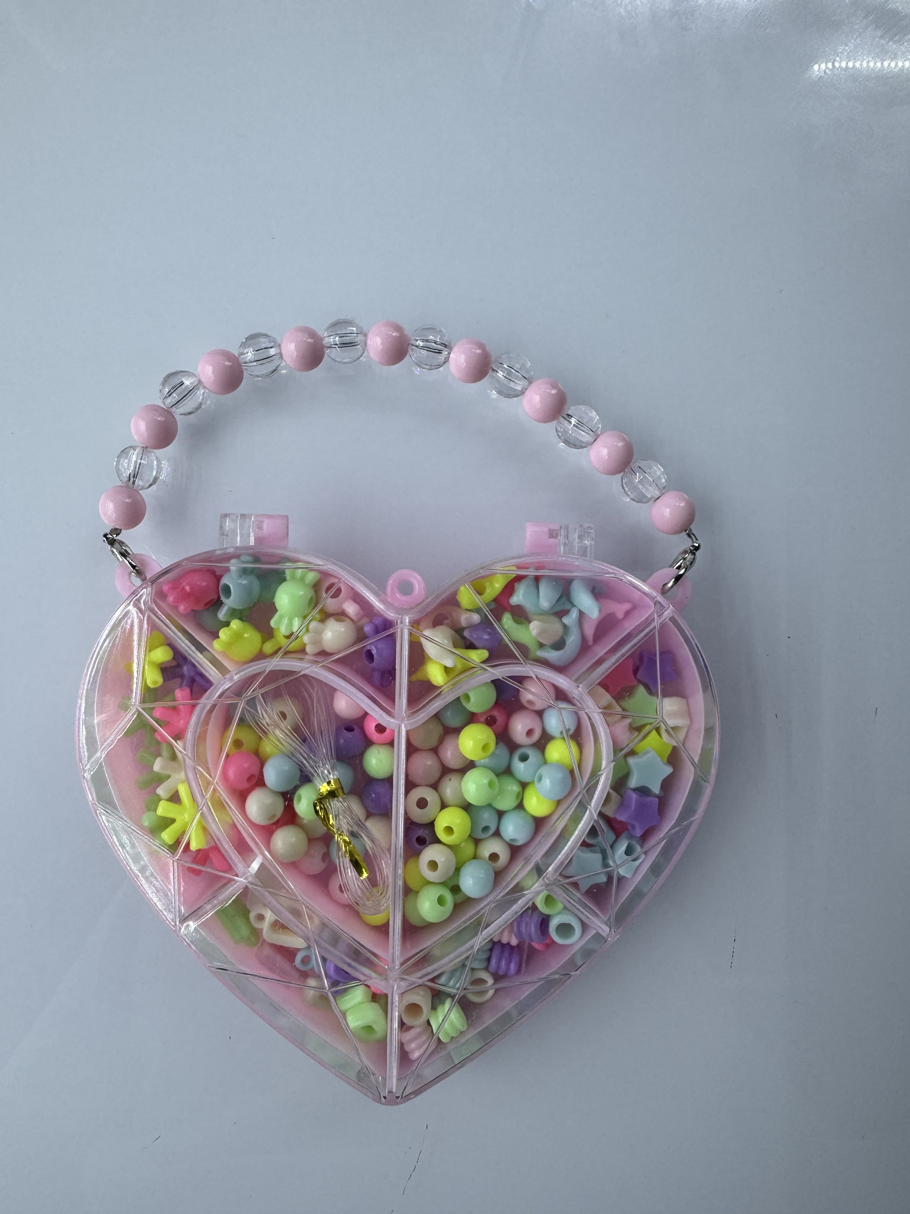 粉色手提爱心卡通串珠，DIY饰品，儿童智力玩具，卡爱卡通造型产品图