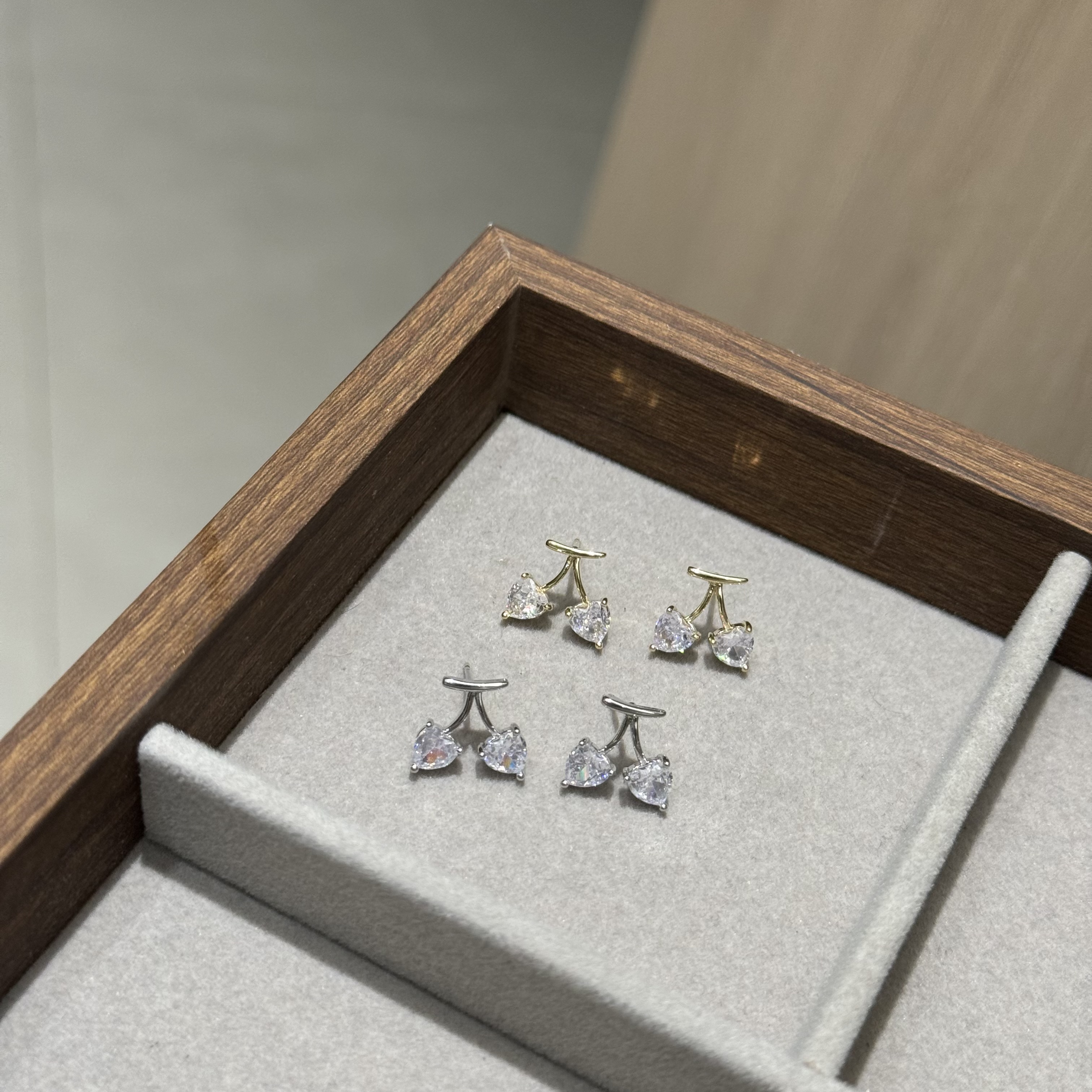 The cherry Zircon style is exquisitely cute with a unique design. The stud earrings are simple and fashionable, making it a refined choice for ladies' jewelry Item Picture