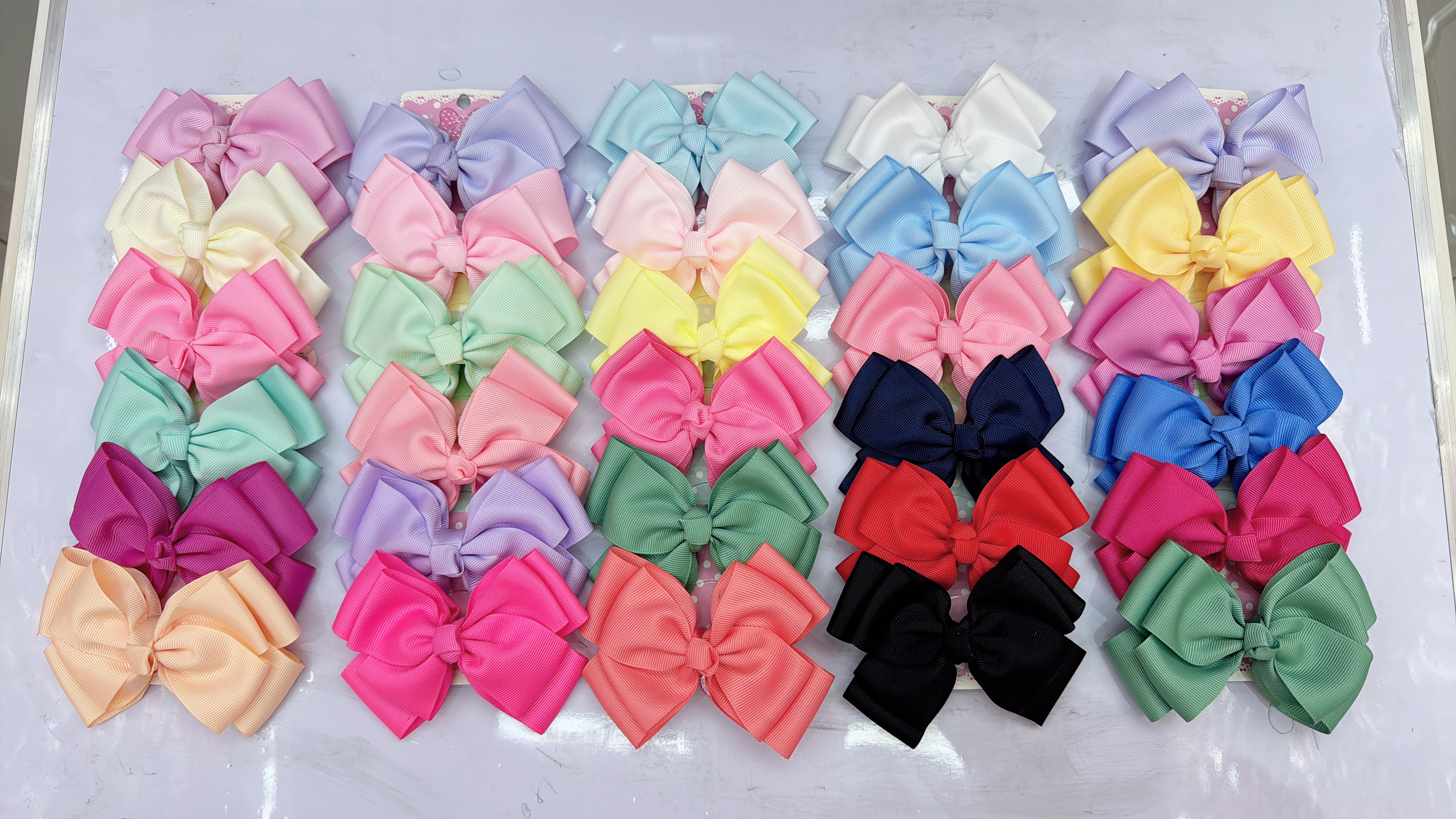 2024年儿童双色拼搭蝴蝶结十1.0宽头扣套布发夹，儿童夏季可爱产品图