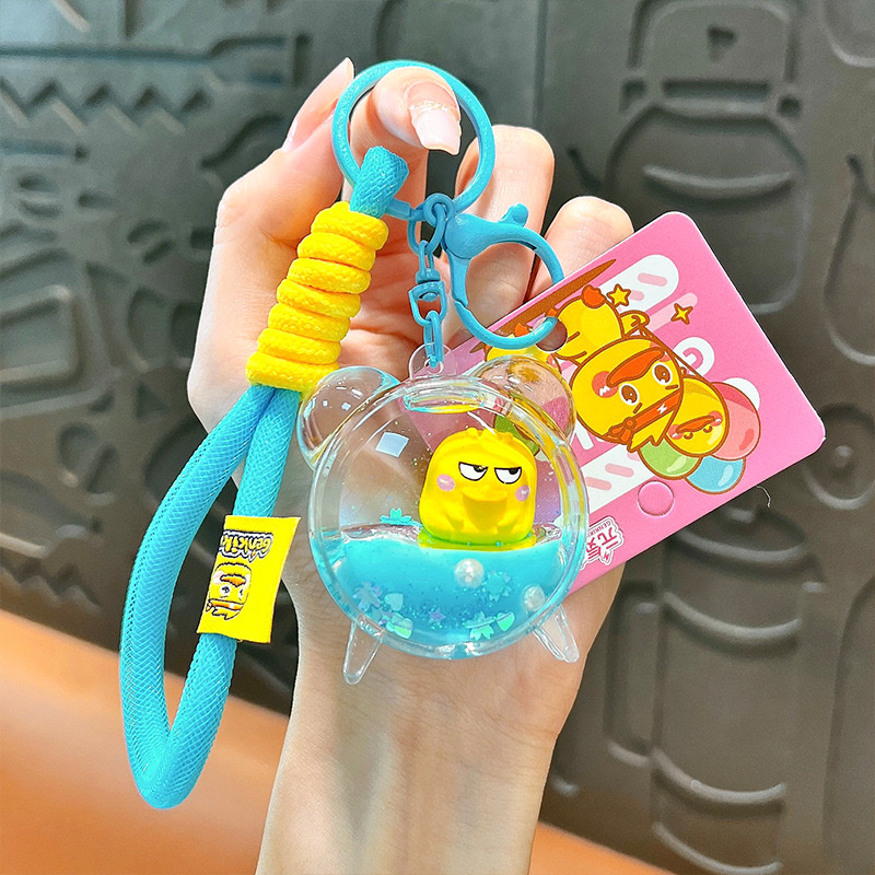 Creative and energetic little yellow duck alarm clock keychain, cute schoolbag pendant, car key chain, small gift wholesale, car pendant, mascot pendant detail image 8