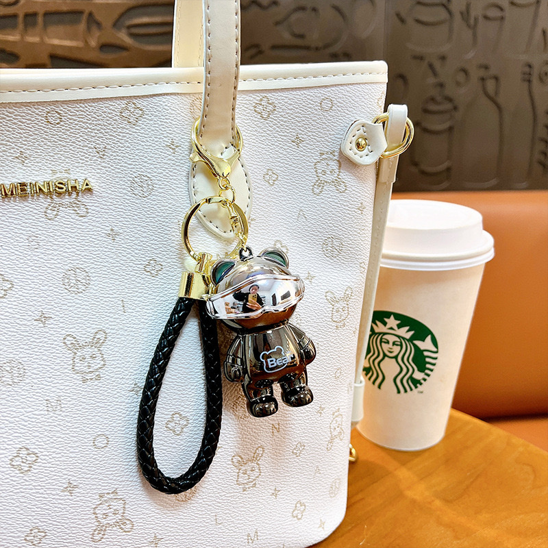 Creative and colorful mechanical bear luminous keychains, electroplated bear key chains, schoolbags, bag pendants, claw machine gifts wholesale Specification image