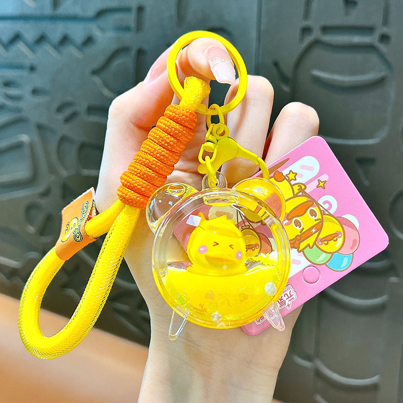 Creative and energetic little yellow duck alarm clock keychain, cute schoolbag pendant, car key chain, small gift wholesale, car pendant, mascot pendant detail image 9