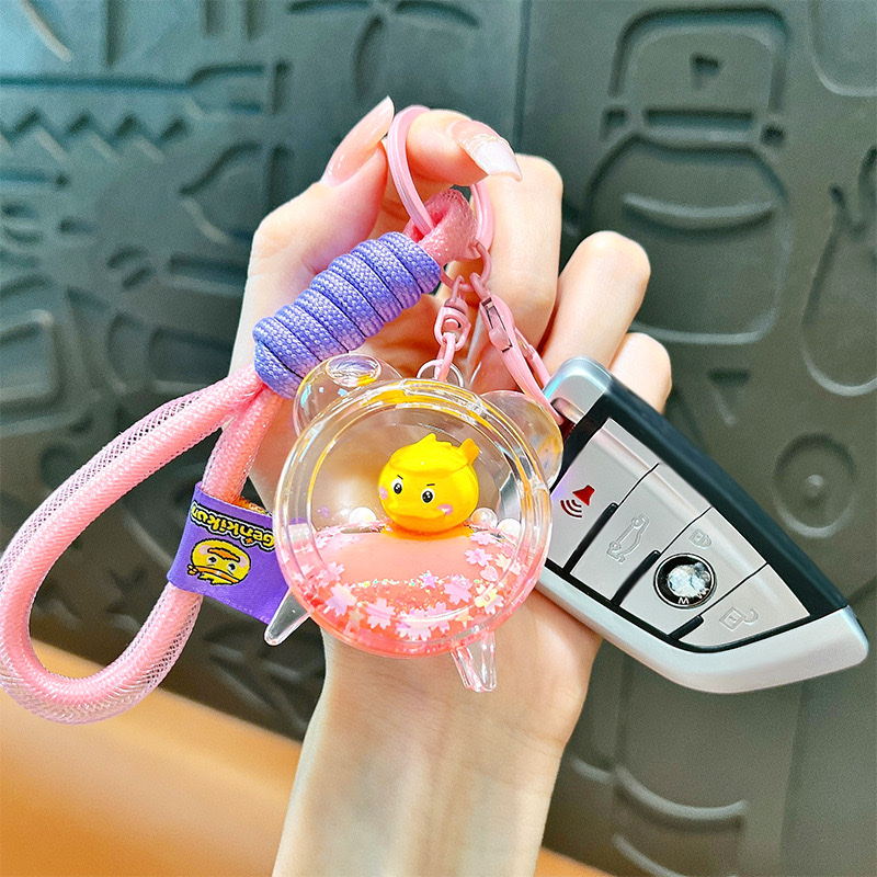 Creative and energetic little yellow duck alarm clock keychain, cute schoolbag pendant, car key chain, small gift wholesale, car pendant, mascot pendant Specification image