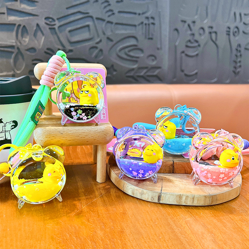 Creative and energetic little yellow duck alarm clock keychain, cute schoolbag pendant, car key chain, small gift wholesale, car pendant, mascot pendant detail image 3