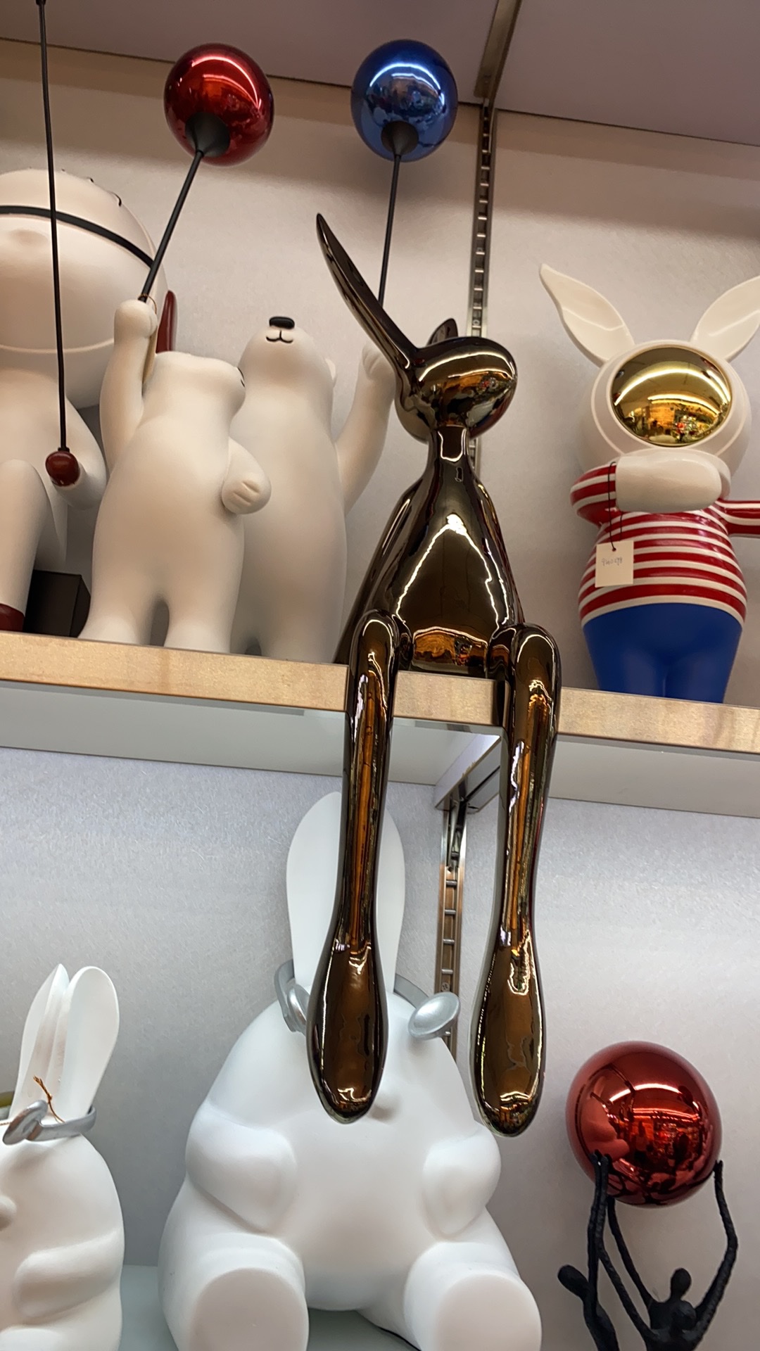 Modern light luxury trend living room cartoon sitting rabbit TV cabinet desktop decoration creative figurine long-eared rabbit figurine details Picture