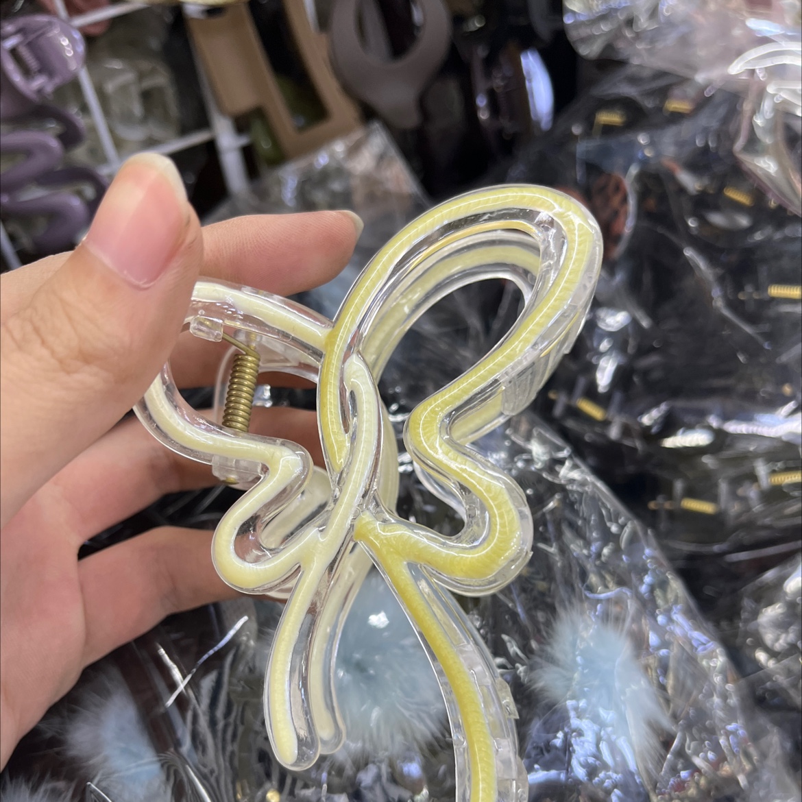 韩版滴油蝴蝶结款塑料发夹发饰产品图