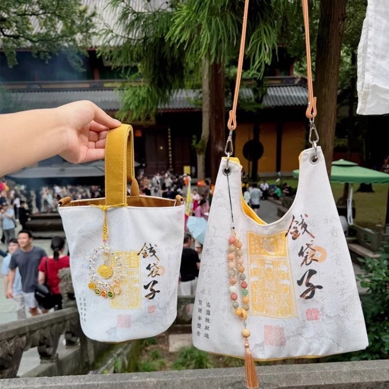 Retail and wholesale of genuine Snake Year bags and handbags for the Lingyin Scenic area in 2024, featuring new styles of bags for getting rich quickly, wealth bags and canvas bags detail image 4
