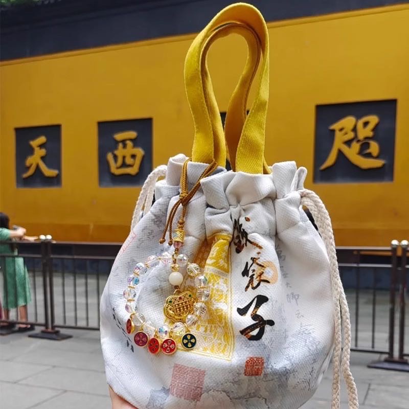 Retail and wholesale of genuine Snake Year bags and handbags for the Lingyin Scenic area in 2024, featuring new styles of bags for getting rich quickly, wealth bags and canvas bags detail image 5