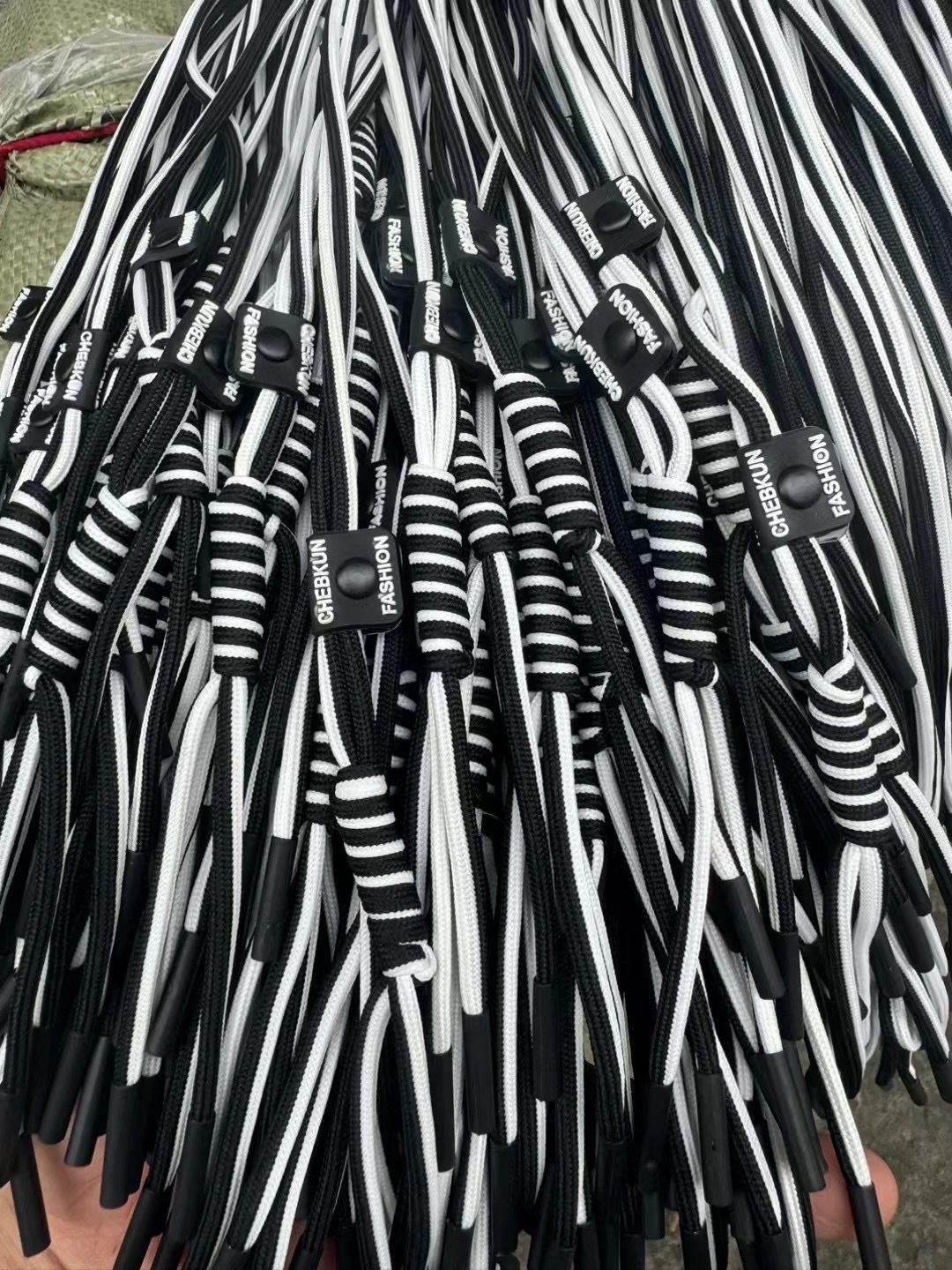 服装辅料绳子厂批发新款涤棉编织绳裤腰绳帽绳抽绳皮标装