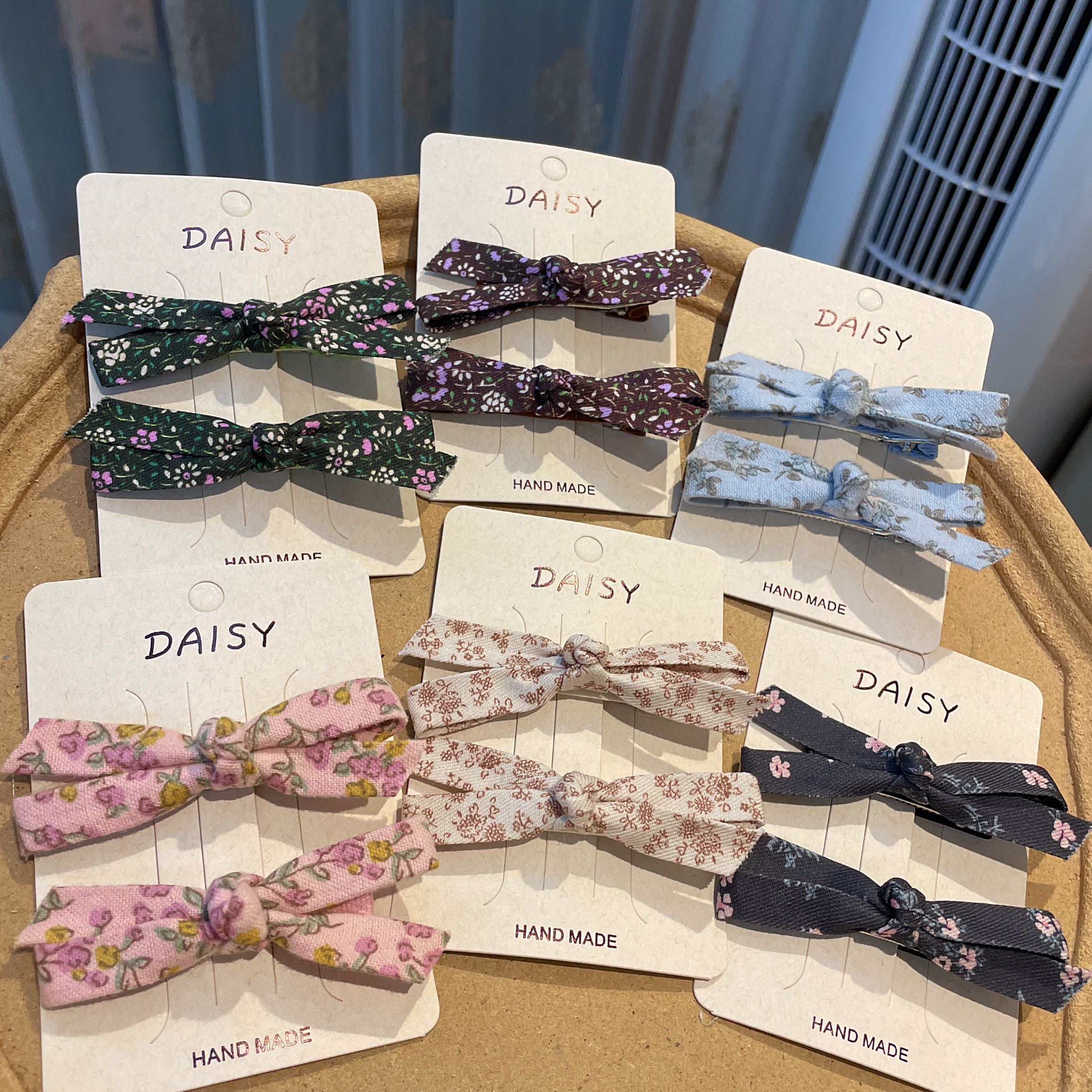 The small floral fabric bow tie and hair clip are so cute for children in summer