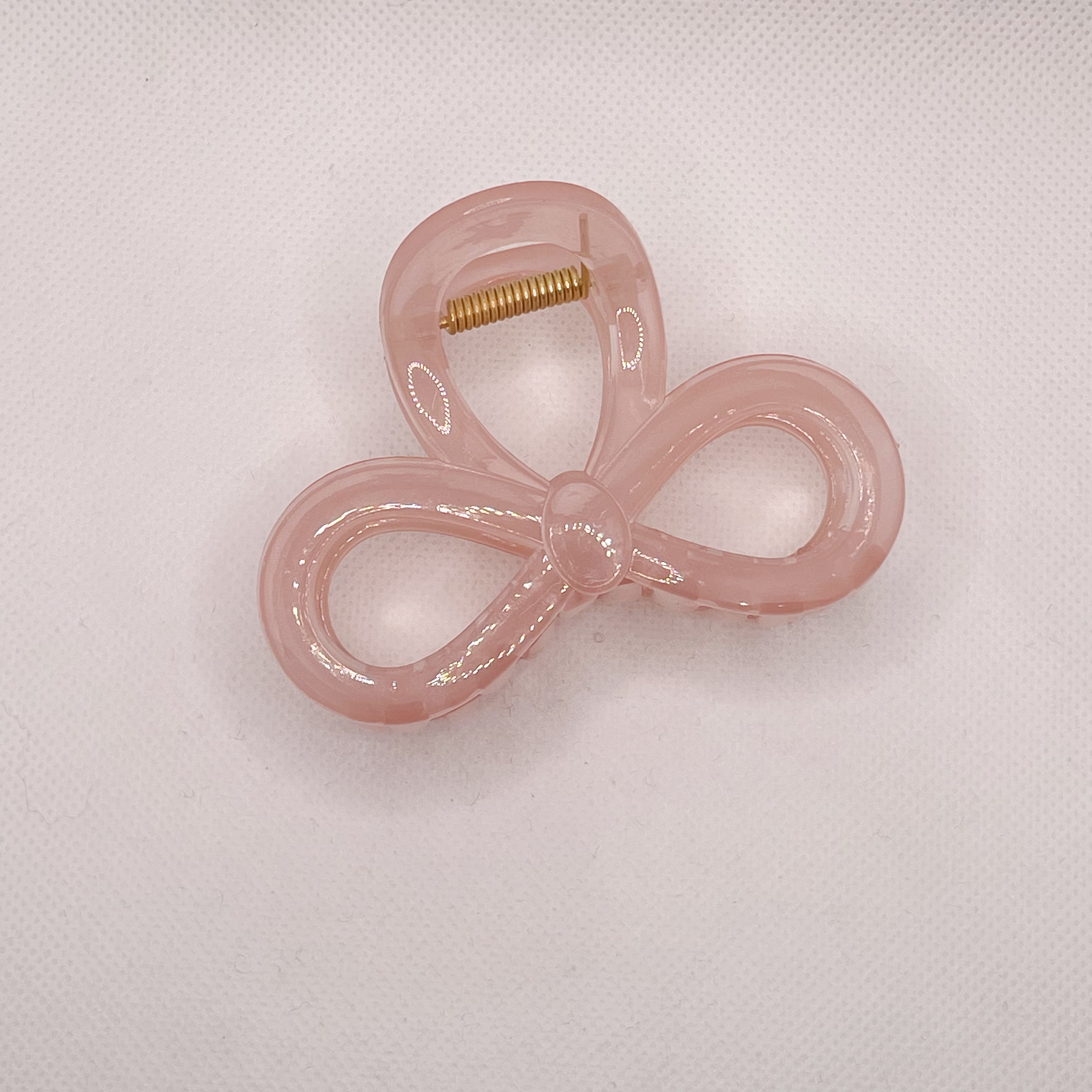 In summer, there is a high-end bow clip for women. The hair volume is small and medium-sized. The hair is coiled at the back of the head. The shark clip is half-tied detail image 8