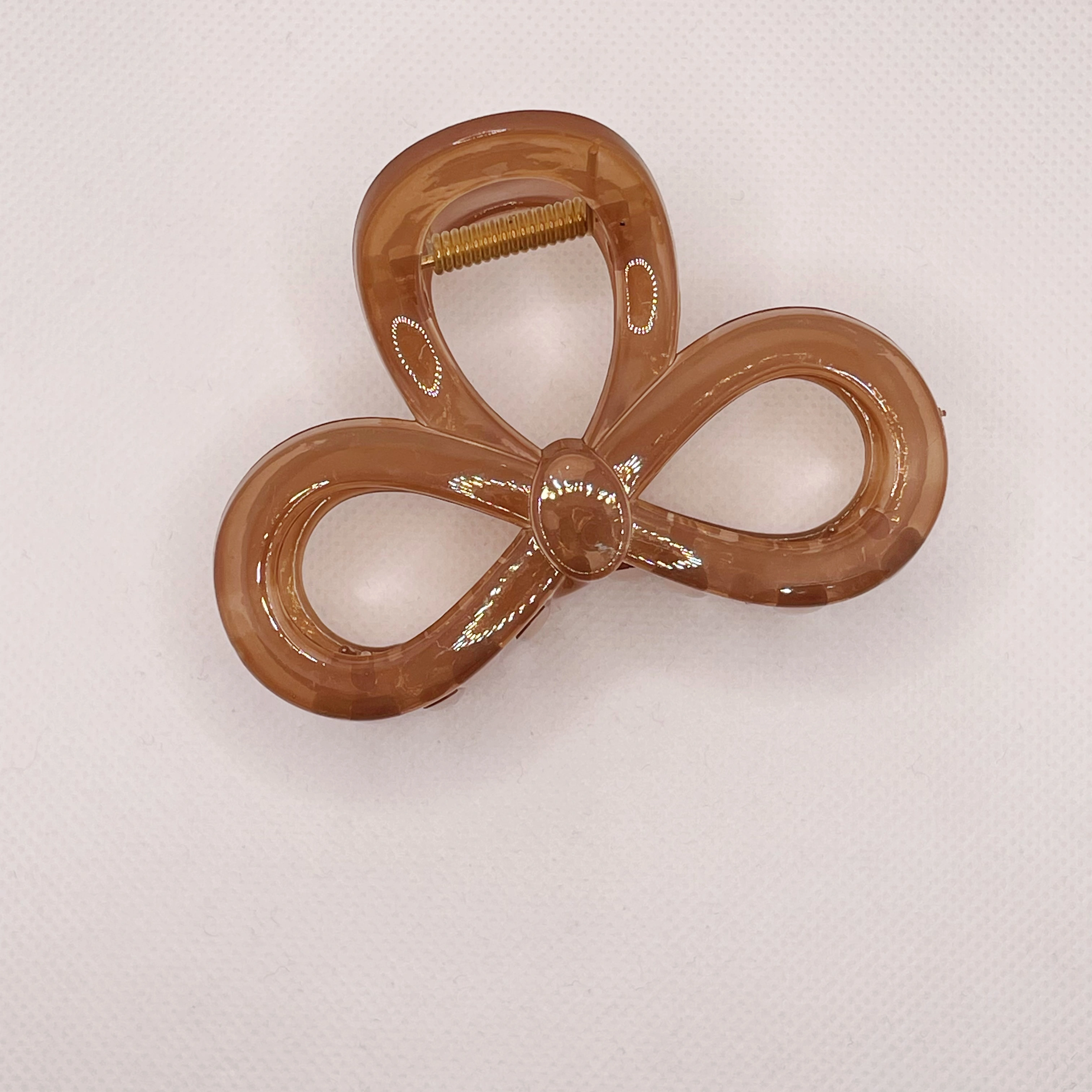 In summer, there is a high-end bow clip for women. The hair volume is small and medium-sized. The hair is coiled at the back of the head. The shark clip is half-tied detail image 7