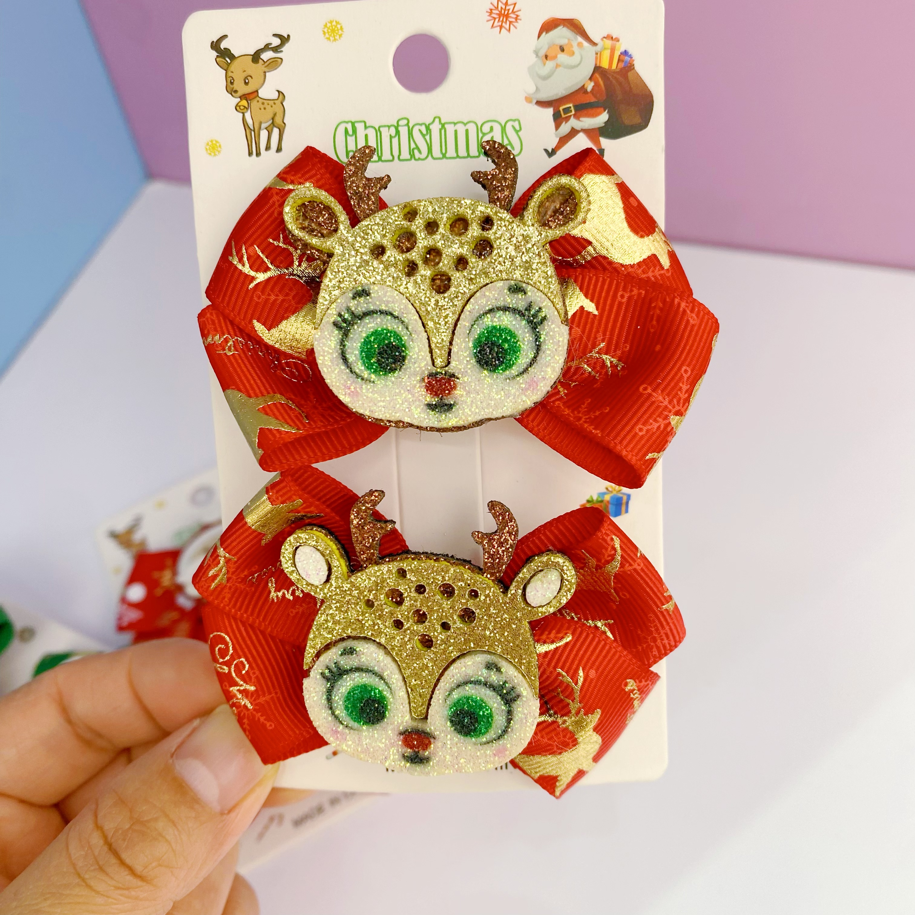 新款圣诞儿童蝴蝶结发夹装饰发饰头饰可爱麋鹿圣诞老人发卡头饰发饰白底实物图