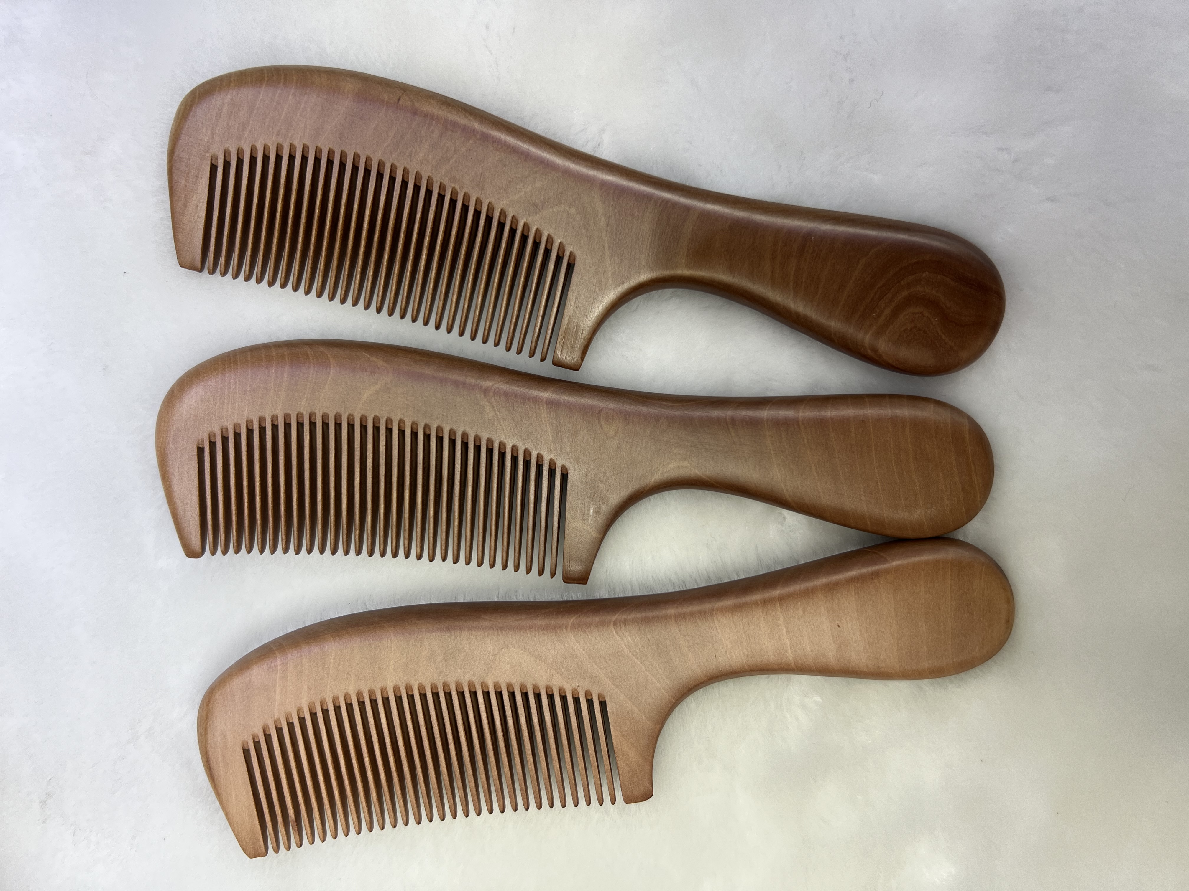 Factory direct sales of natural wood combs, high-quality nanmu combs with handles and fine teeth, household gift combs detail image 2