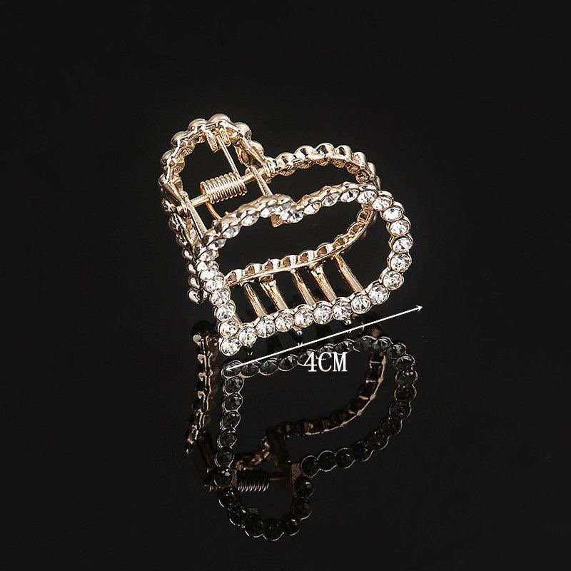 Korean version Jinju top hair clip, alloy electroplated back head clamp, simple and fashionable women's versatile hair and lazy person's hair clamp headwear detail image 1