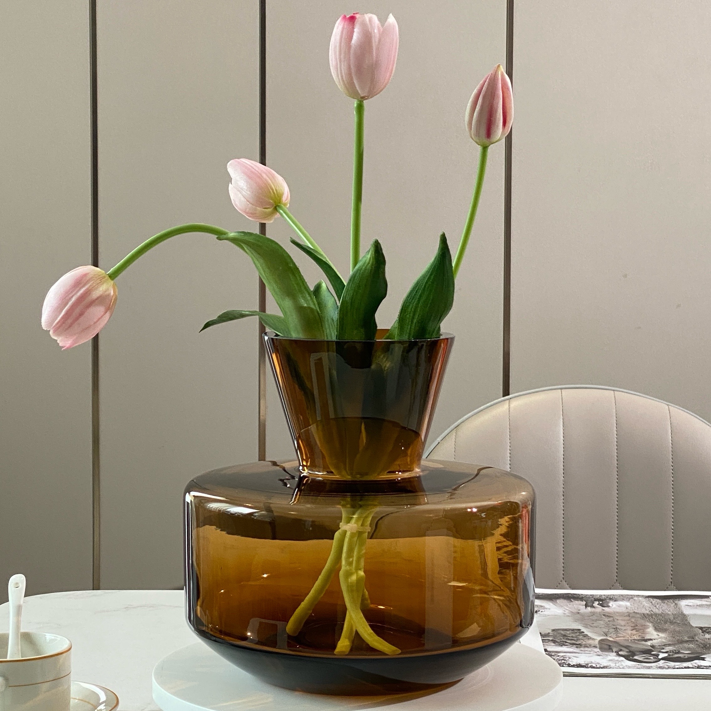 A light luxury and simple Danish designer's creative amber glazed glass vase for home and living room flower arrangement decoration Application Scenario