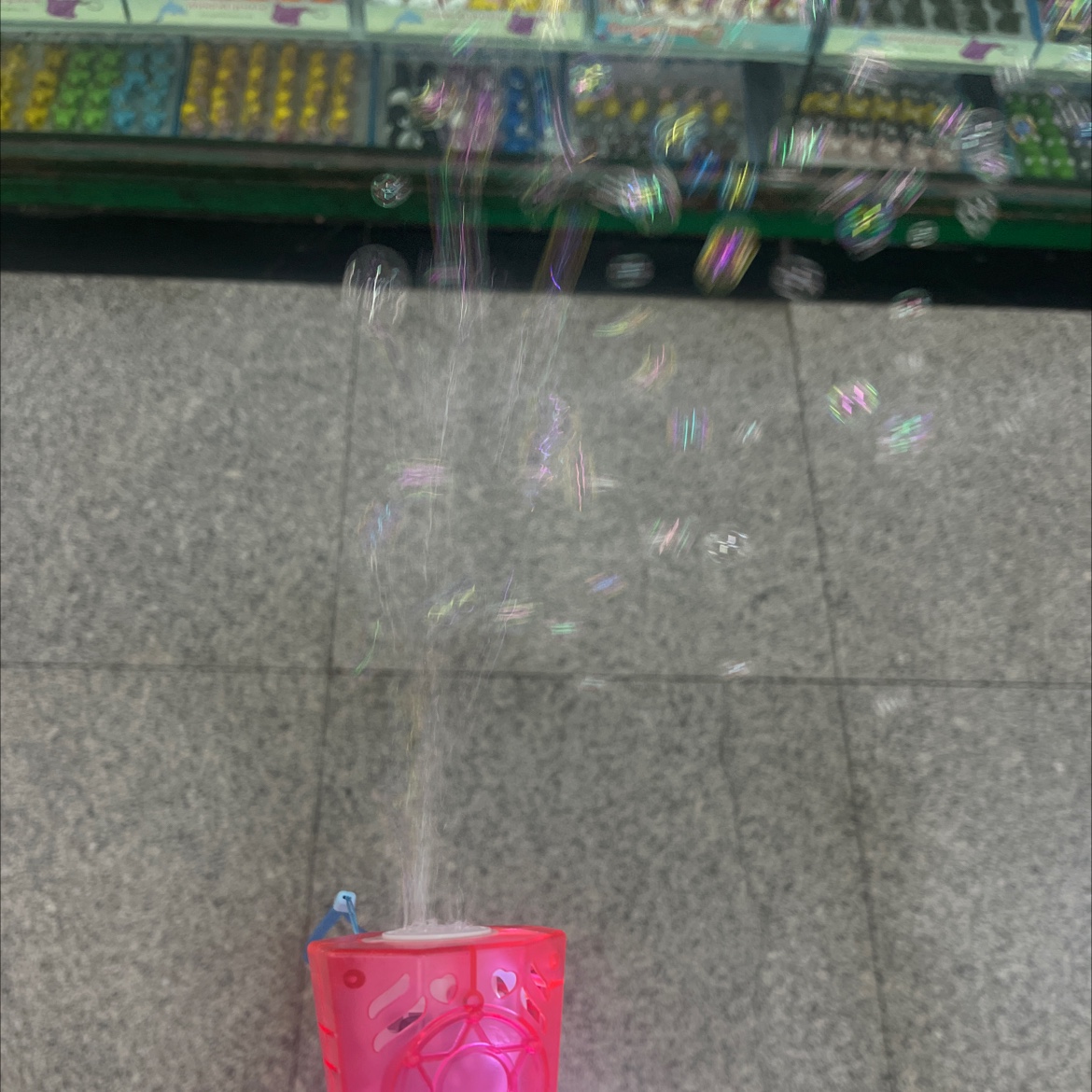 Compact in size and easy to carry, it is suitable for use when going out for a trip. A children's toy with a solution at the end that can blow bubbles. By waving or blowing air, the bubbles are formed and float in the air. pic 2