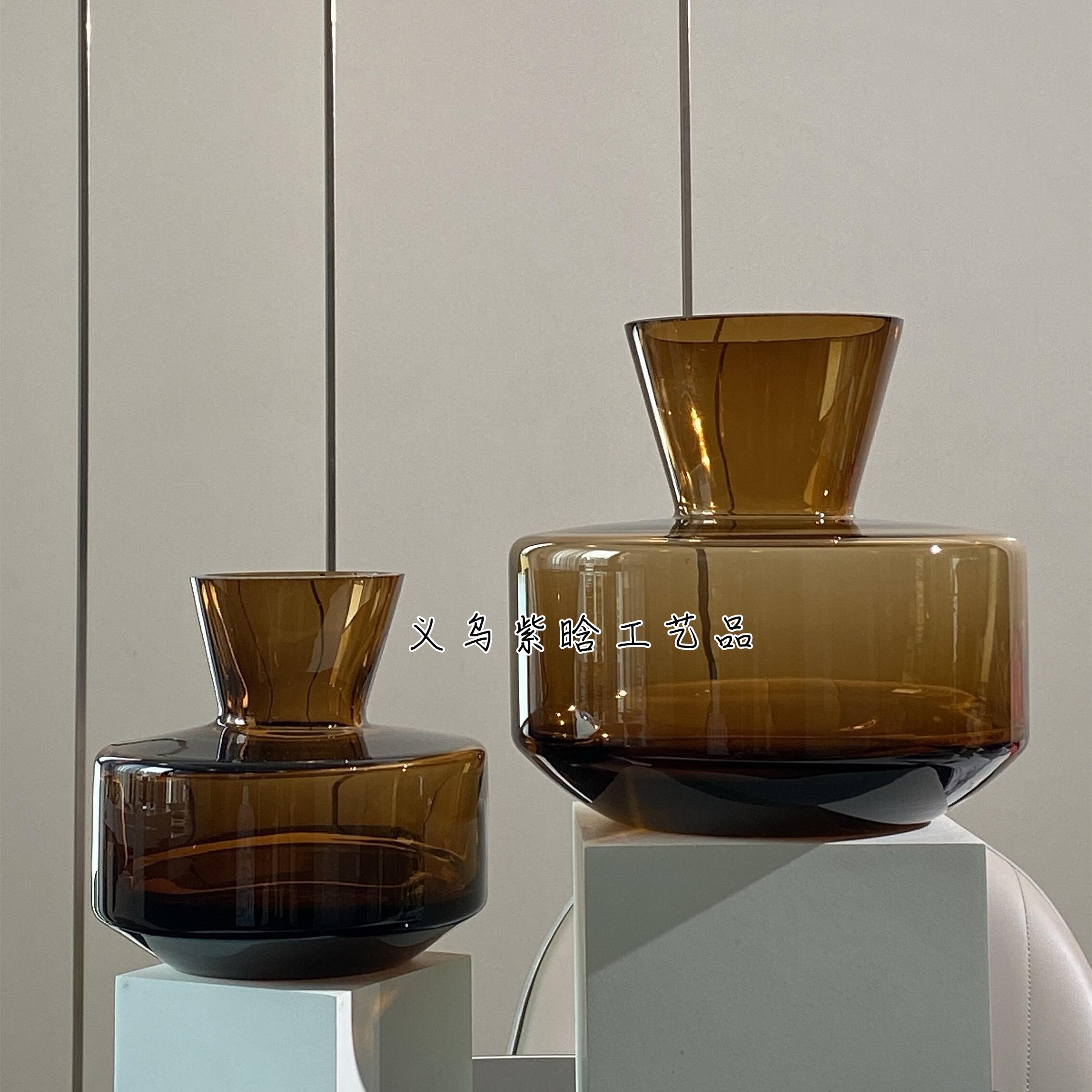 A light luxury and simple Danish designer's creative amber glazed glass vase for home and living room flower arrangement decoration details Picture