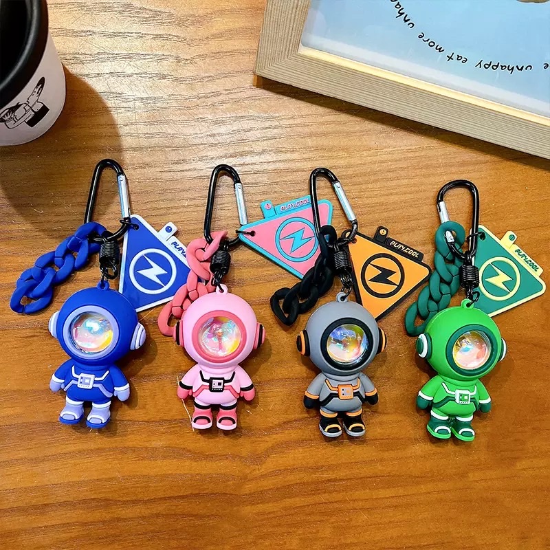 Creative and cool series ambient lights, astronaut keychains, cute schoolbag pendants, car key chains, gift pendants