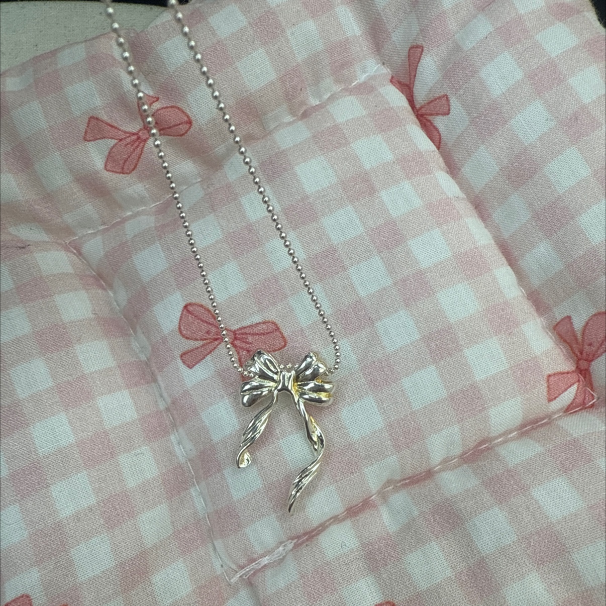 The S925 bow necklace is made of pure silver throughout. It is a Korean-style jewelry with a fresh and simple design. It is a DIY style and a niche Japanese and Korean item detail image 5