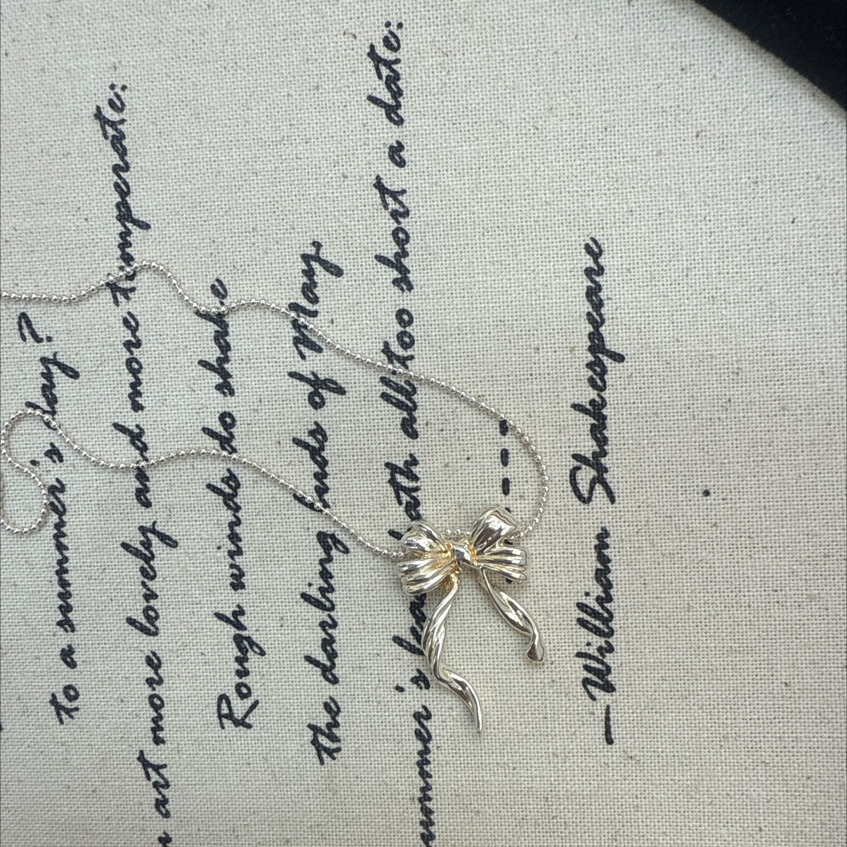 The S925 bow necklace is made of pure silver throughout. It is a Korean-style jewelry with a fresh and simple design. It is a DIY style and a niche Japanese and Korean item details Picture