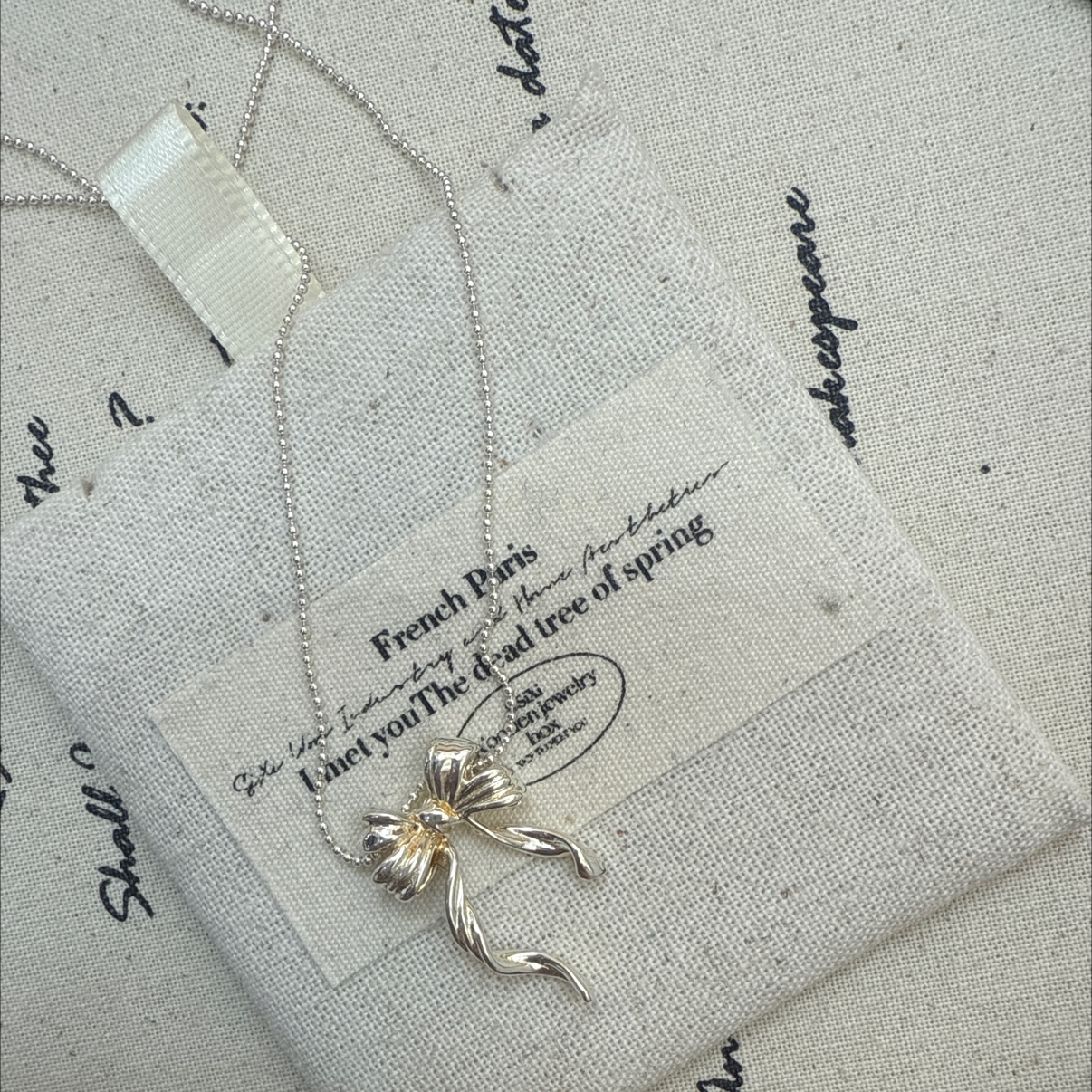 The S925 bow necklace is made of pure silver throughout. It is a Korean-style jewelry with a fresh and simple design. It is a DIY style and a niche Japanese and Korean item detail image 3
