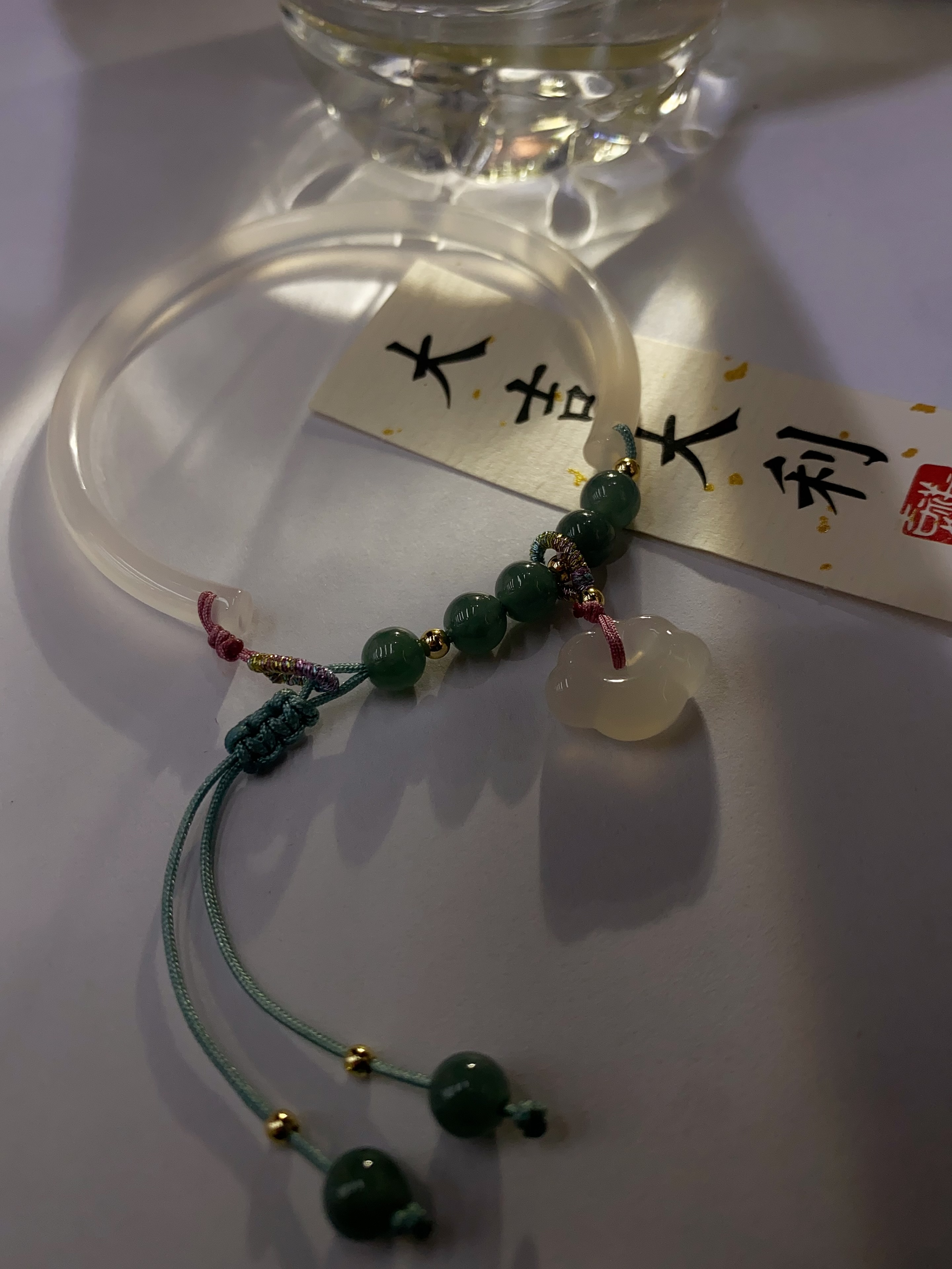 天然玉髓半镯        蓝水翡翠 绳结玉髓锁 水晶手串 半打起批产品图