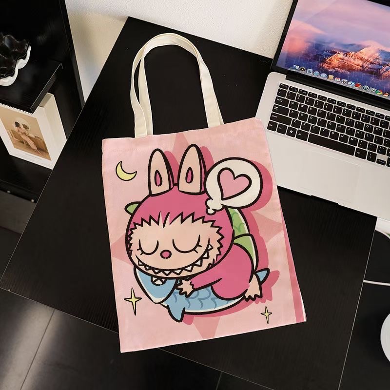 原创设计帆布包 多功能可背斜挎 布包潮流款 带钥匙包便携实用时尚帆布包详情图9