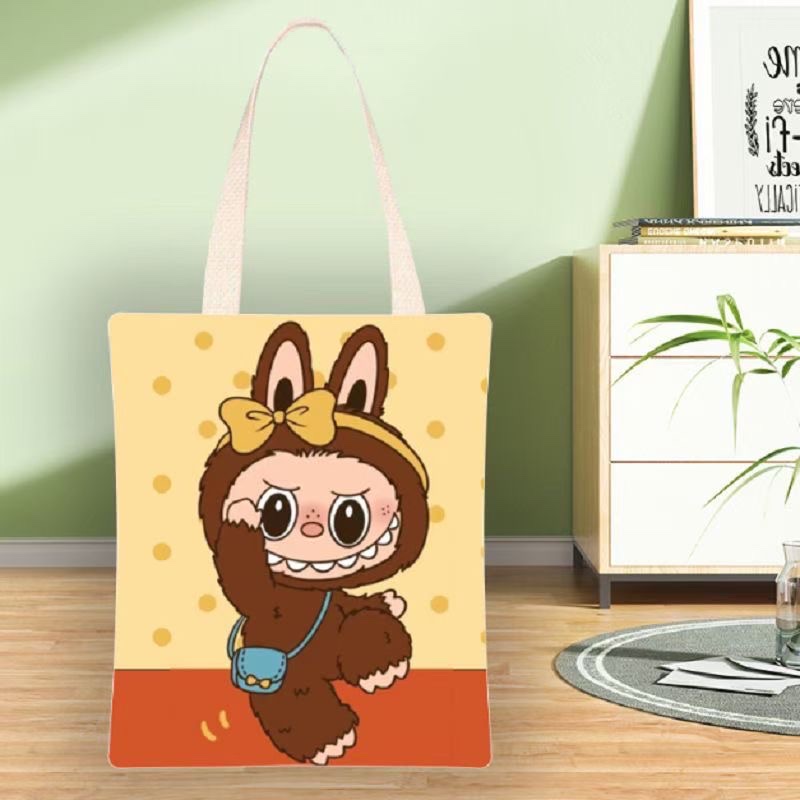 原创设计帆布包 可背斜挎布包 时尚休闲钥匙包 实用便携帆布包款产品图