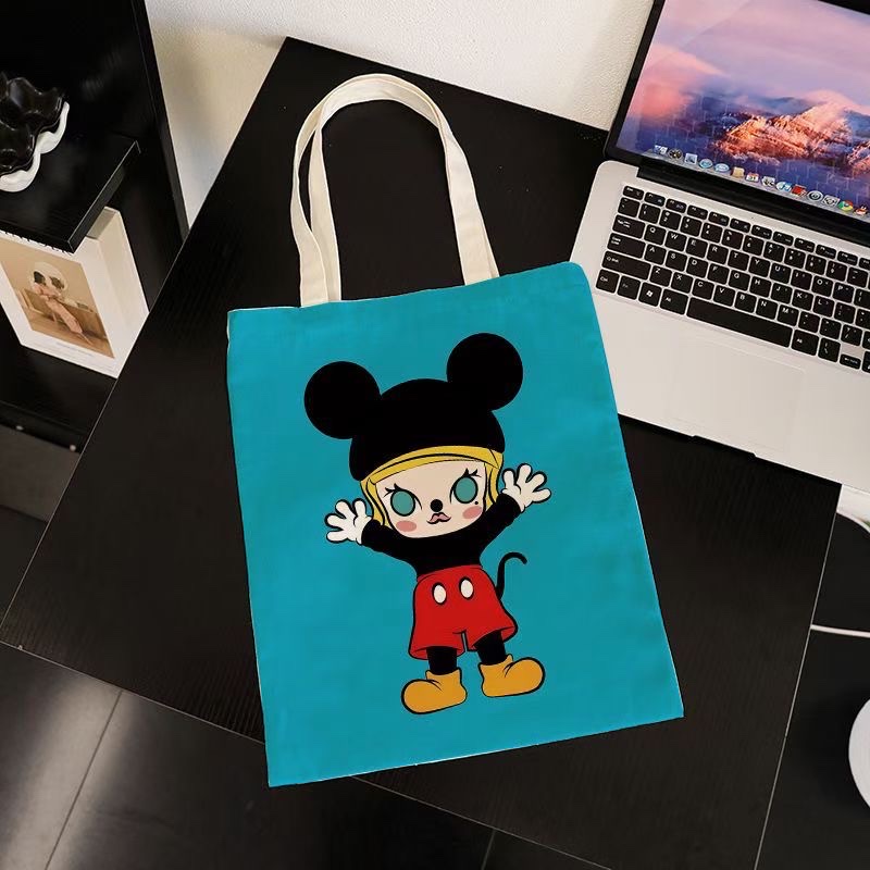 原创设计帆布包 多功能可背斜挎 布包潮流款 带钥匙包便携实用时尚帆布包产品图