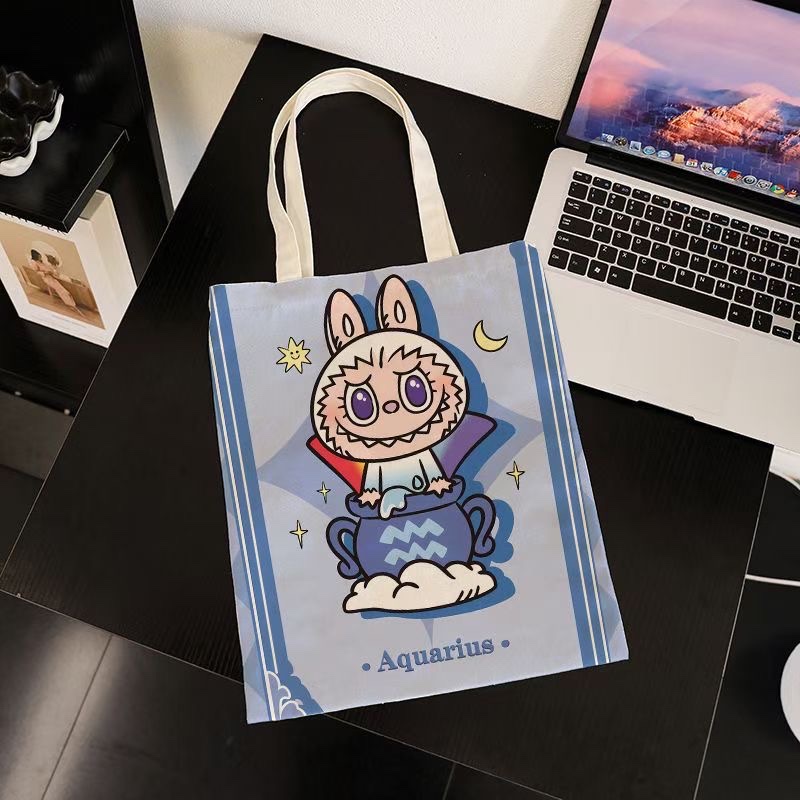 原创设计帆布包 多功能可背斜挎 布包潮流款 带钥匙包便携实用时尚帆布包详情图8