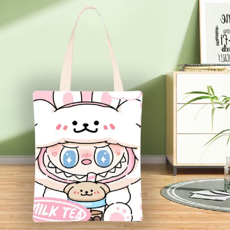 原创设计帆布包 可背斜挎布包 时尚休闲钥匙包 实用便携帆布包款细节图