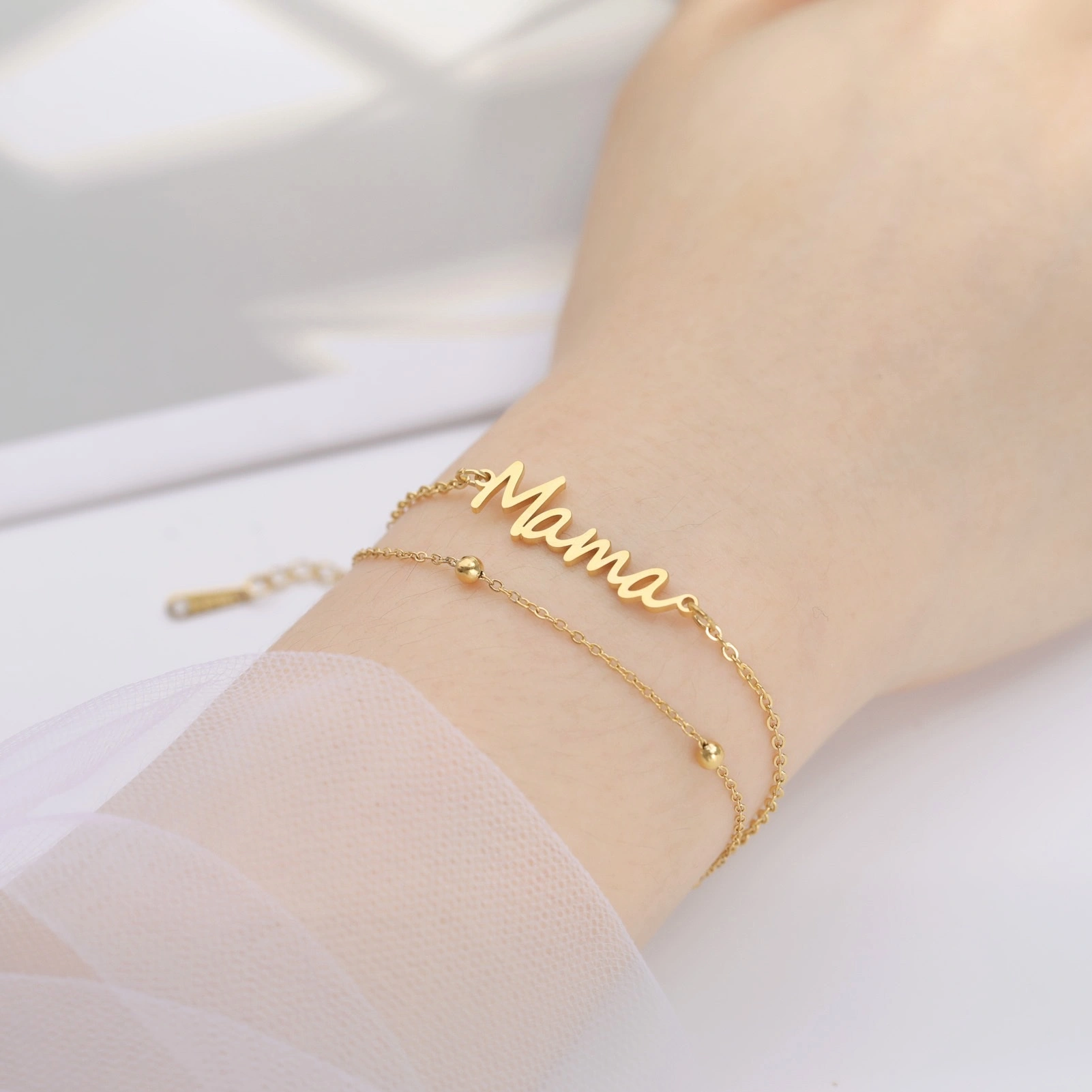 Factory direct sales of simple cut titanium steel Mama text pendants from Europe and America, Mother's Day stainless steel double-layer chain bracelets, versatile for women detail image 1