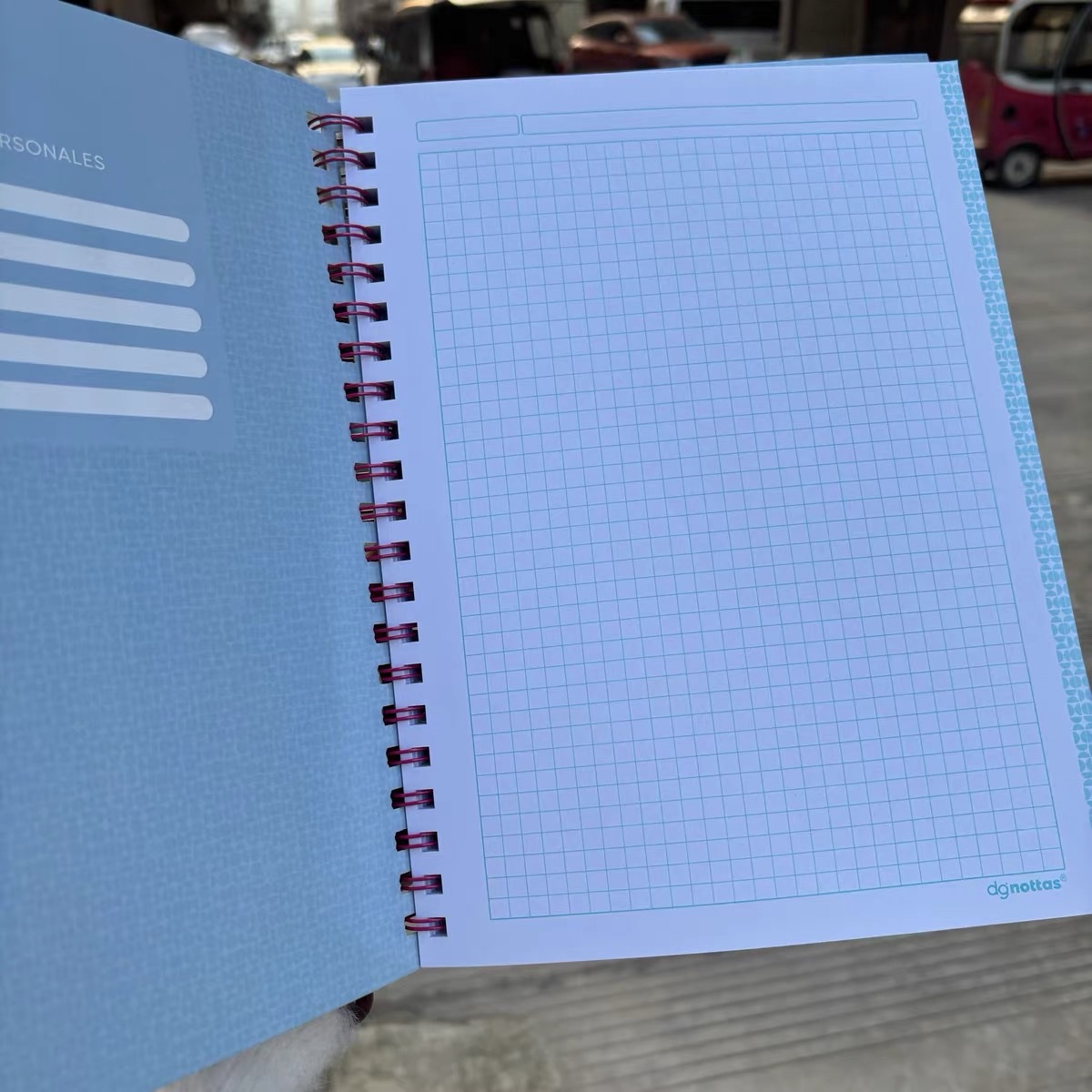 Customized foreign trade notebook and notepad, American A4 paper cover, coil grid notebook, light blue grid, black series, large grid notebook, cartoon coil planner notebook Specification image