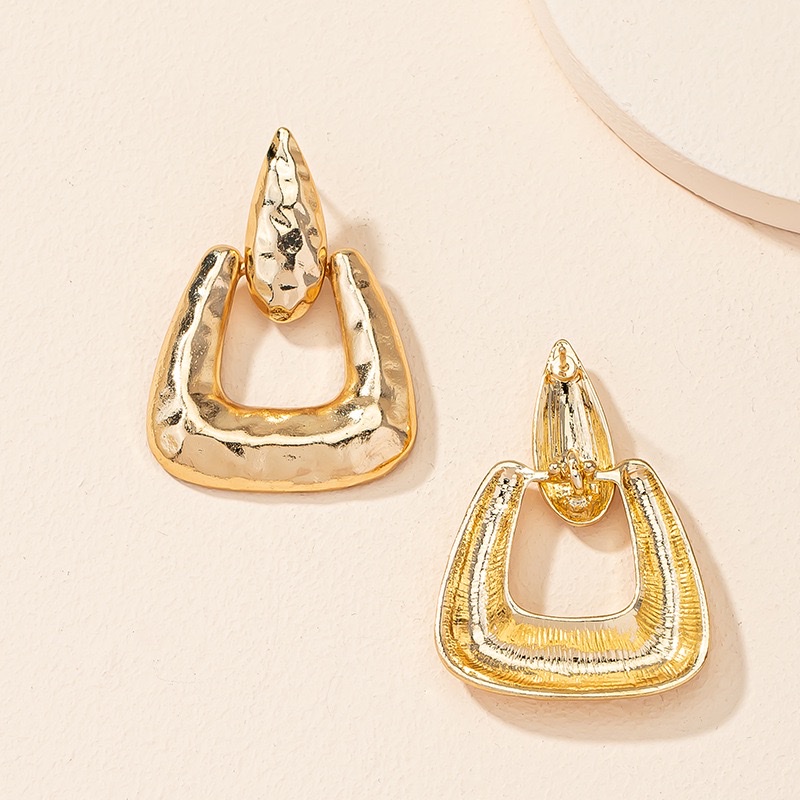 French geometric irregular triangle earrings with a high-end feminine touch, cold and elegant style, stud earrings, and European and American trendy alloy earrings detail image 5