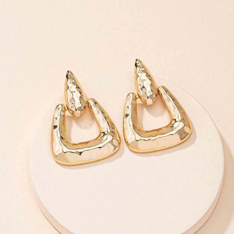 French geometric irregular triangle earrings with a high-end feminine touch, cold and elegant style, stud earrings, and European and American trendy alloy earrings detail image 3