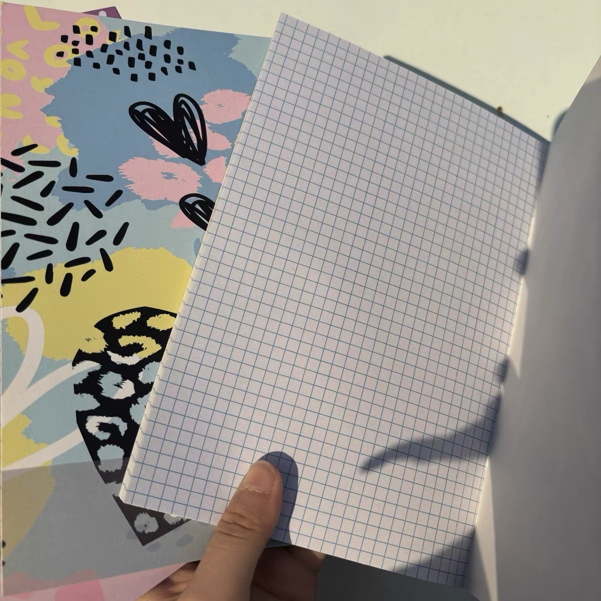 Customized foreign trade notebooks for export to Turkey, saddle-staked light blue grid flower notebooks, textbook coil notebooks, diary books Specification image
