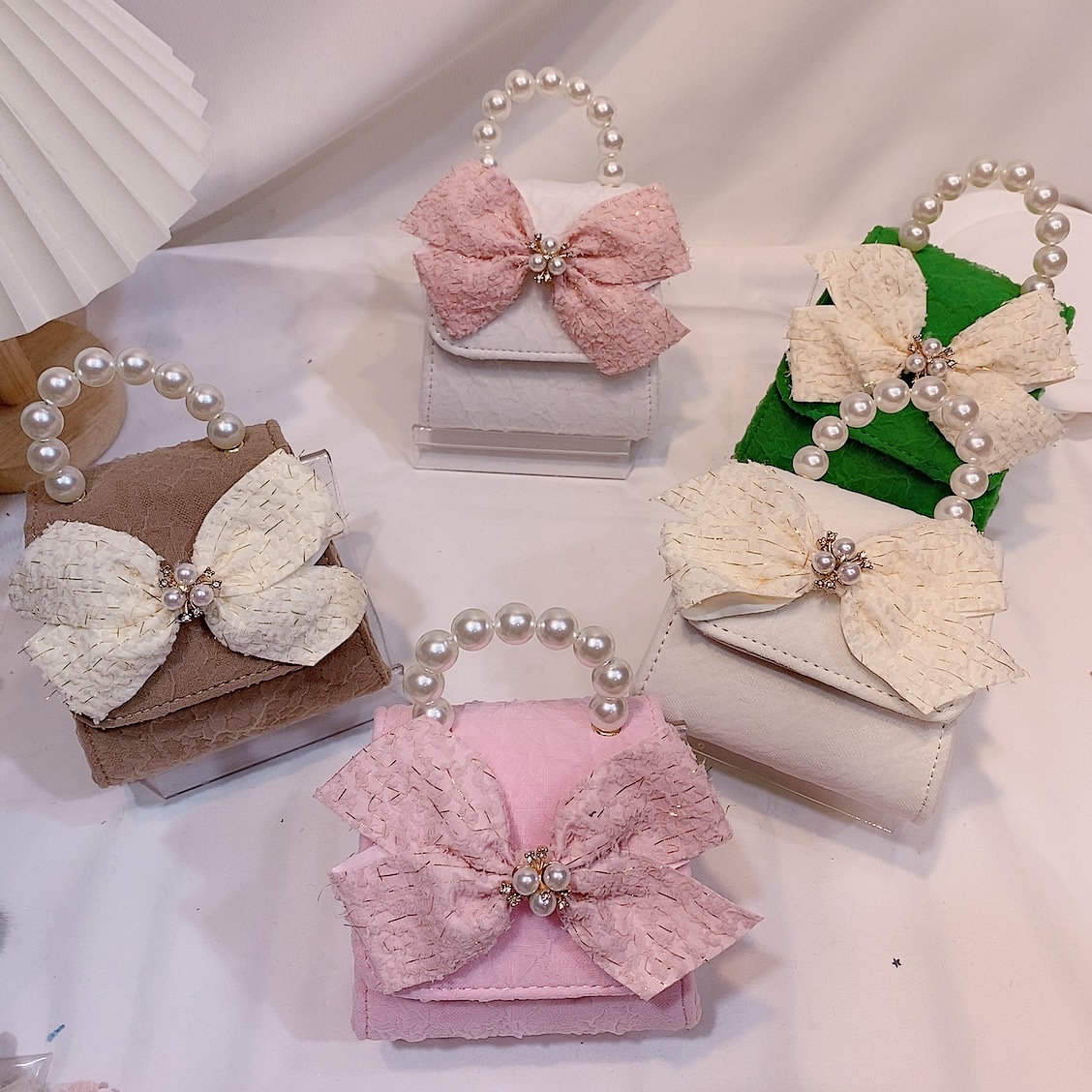 泡泡纱小斜跨包潮流韩版时尚大方韩版蝴蝶结三颗小珠配饰小包