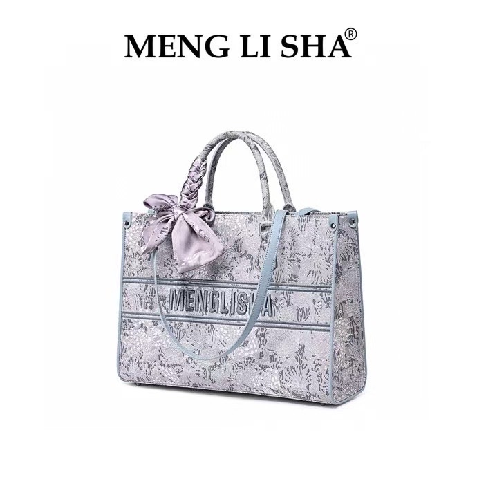 国风提花布刺绣配皮
，个性潮流手提斜跨百搭时尚女包