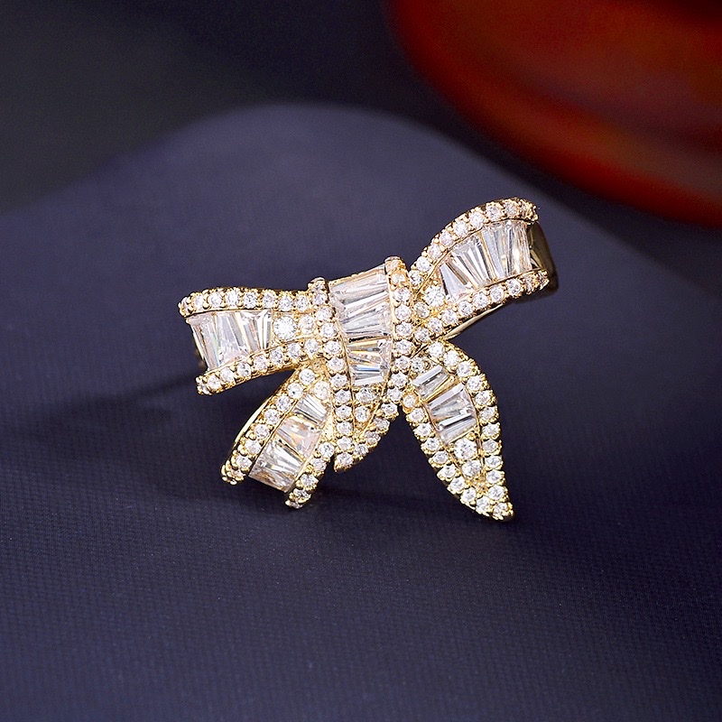 "National Trend Series 0112 Omar Accessories: Small and exquisite bow brooch, full of zirconium style, versatile corsage, niche and creative clothing accessories pin.